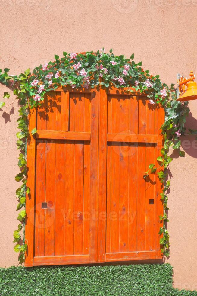 orange color wooden door texture background photo