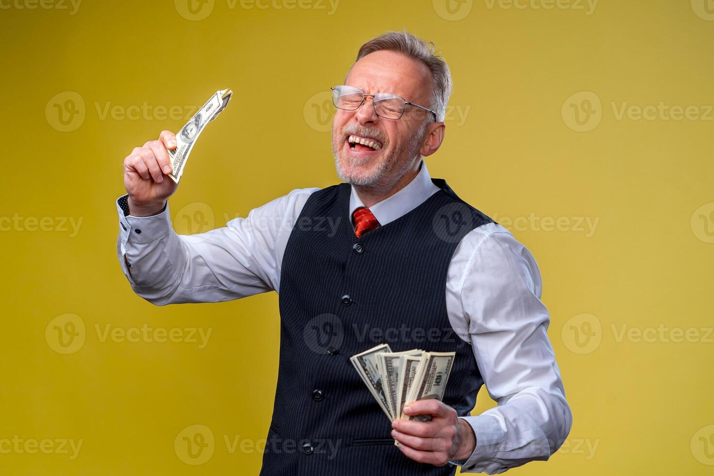 Happy man enjoying money. Hands with money, US dollars, business man, rich with success. Positive emotion facial expression feelings. photo