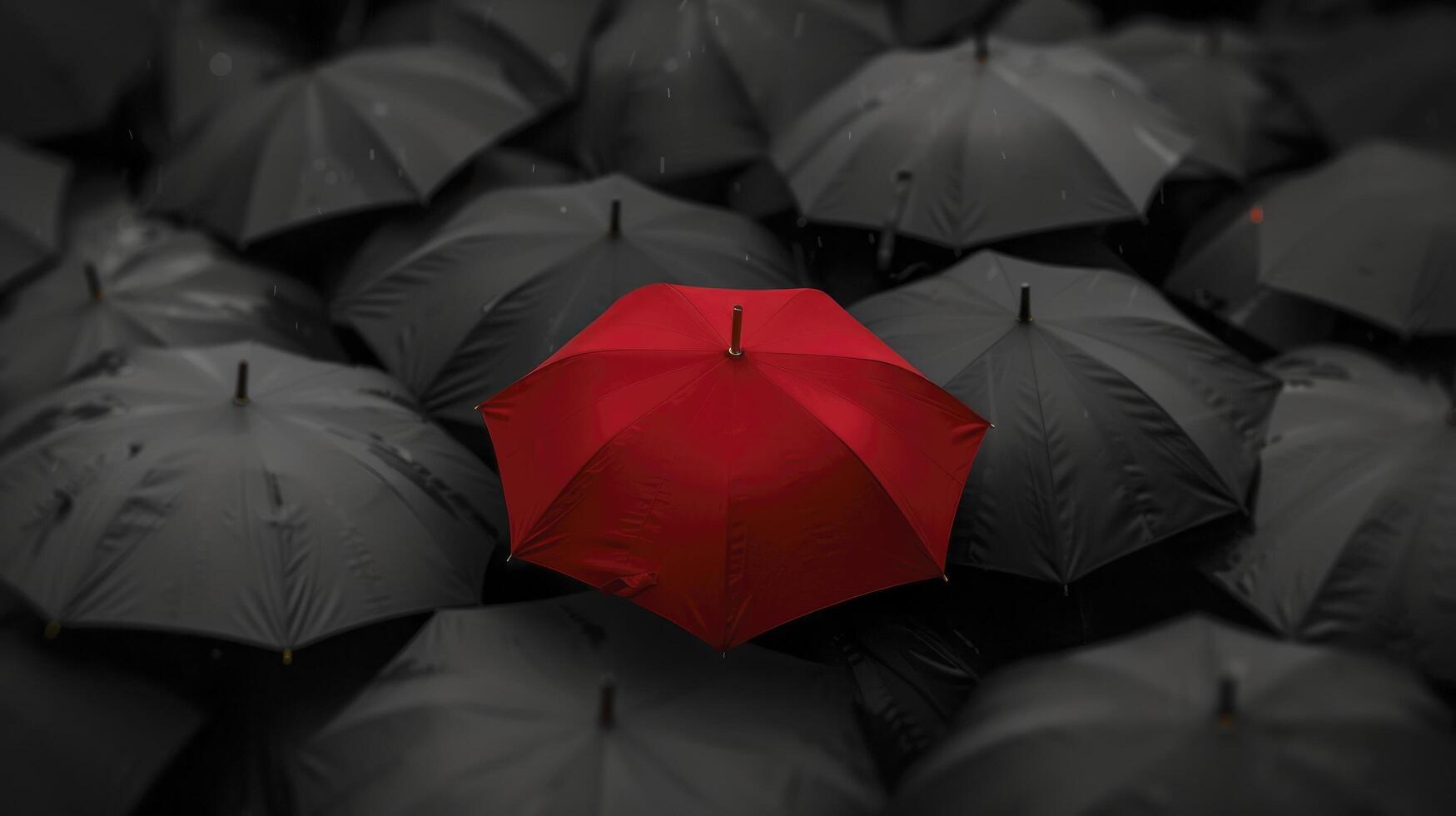 AI generated A red umbrella among the black umbrellas. Contrast concept. photo
