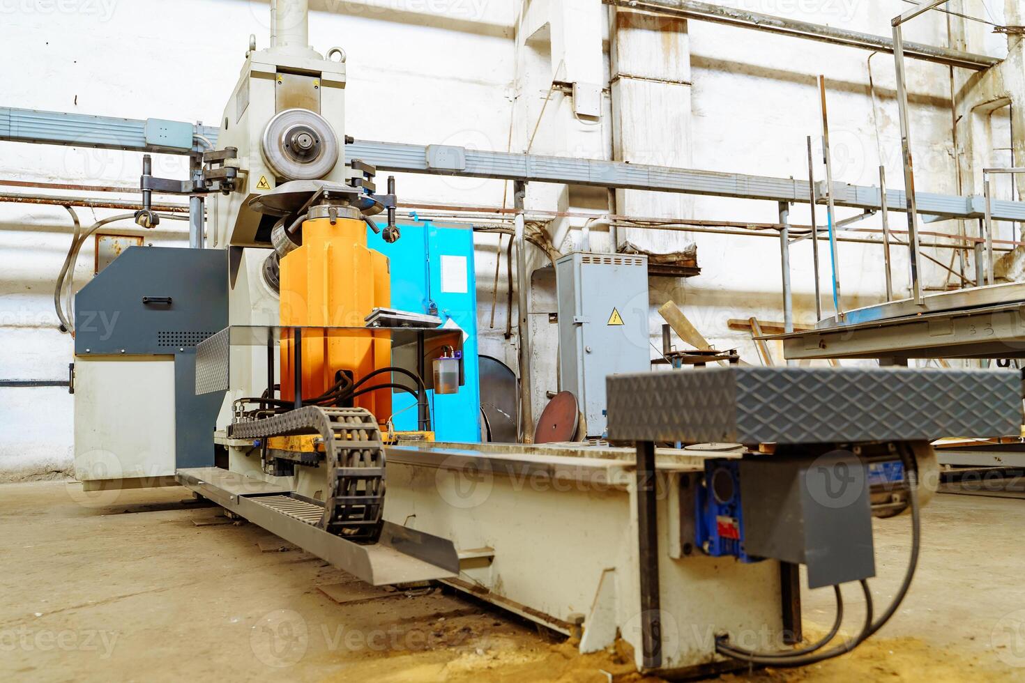 Drilling machine working process on metal factory photo