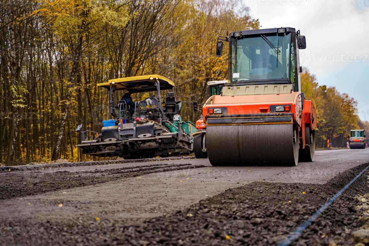 Close view on the road roller working on the new road construction site. Selective focus. Closeup photo