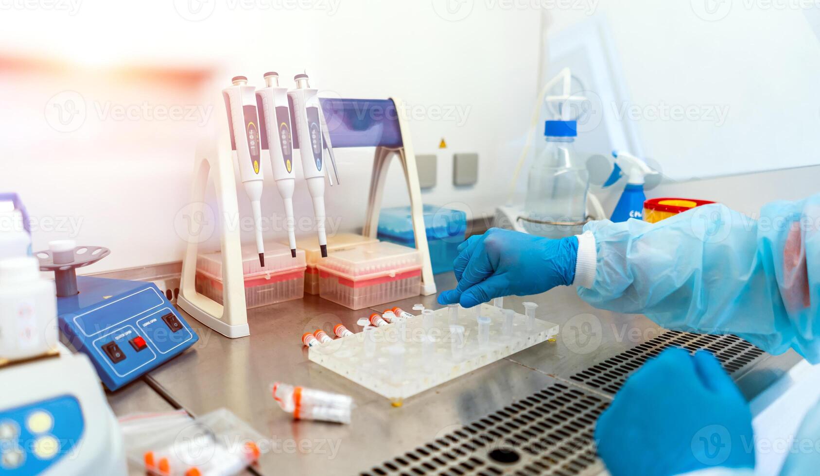 Professional laboratory assistant taking blood test for DNA research. Healthcare and biotechnology. DNA research. Cropped photo. photo