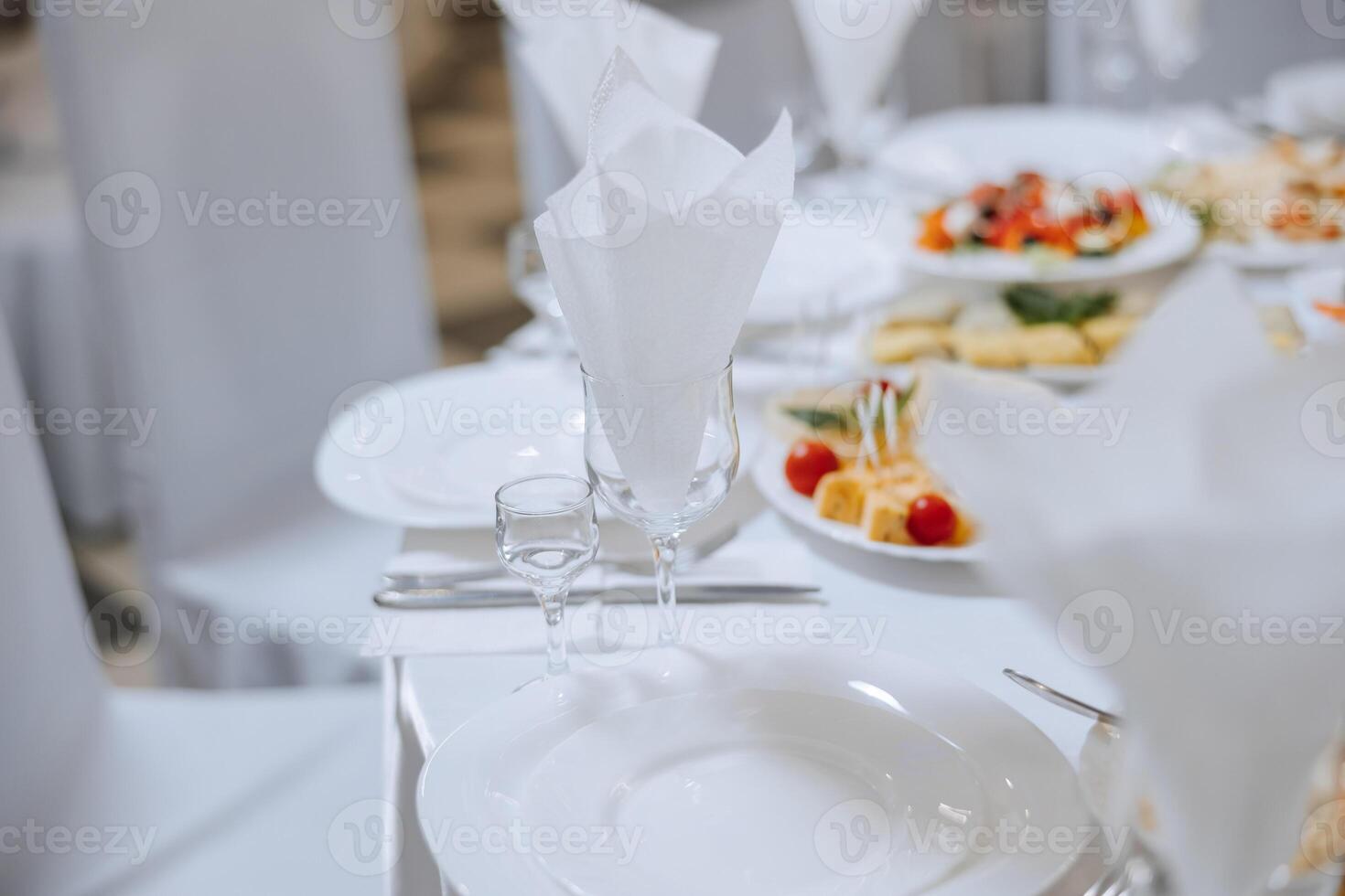 Top view of a beautifully decorated table with delicious food. Everything is ready for lunch or dinner with delicious snacks and a cozy atmosphere. photo