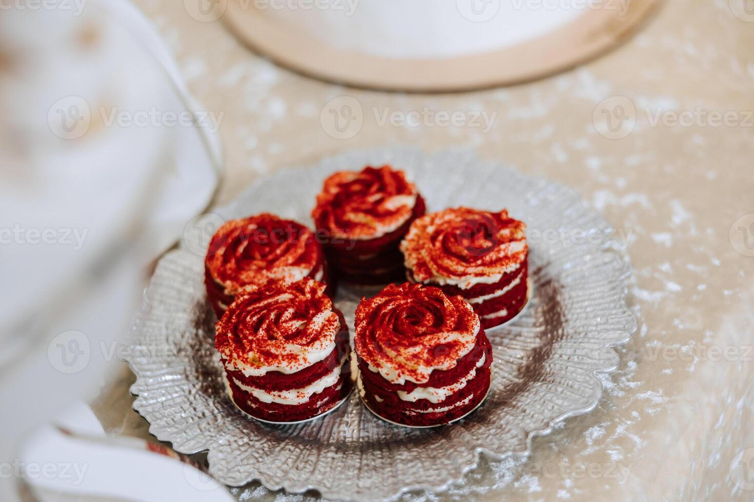 Almond cookies, sweet cakes for a wedding banquet. A delicious reception, a luxurious ceremony. Table with sweets and desserts. Delicious colorful French desserts on a plate or table. Candy bar. photo