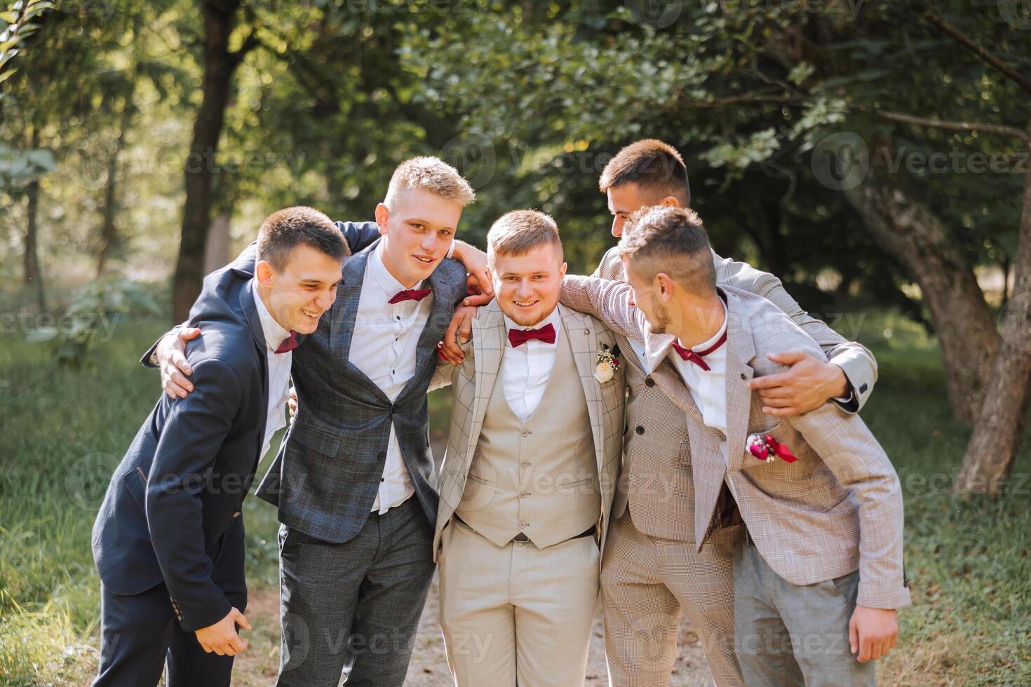 Wedding photography. The groom and his friends photo