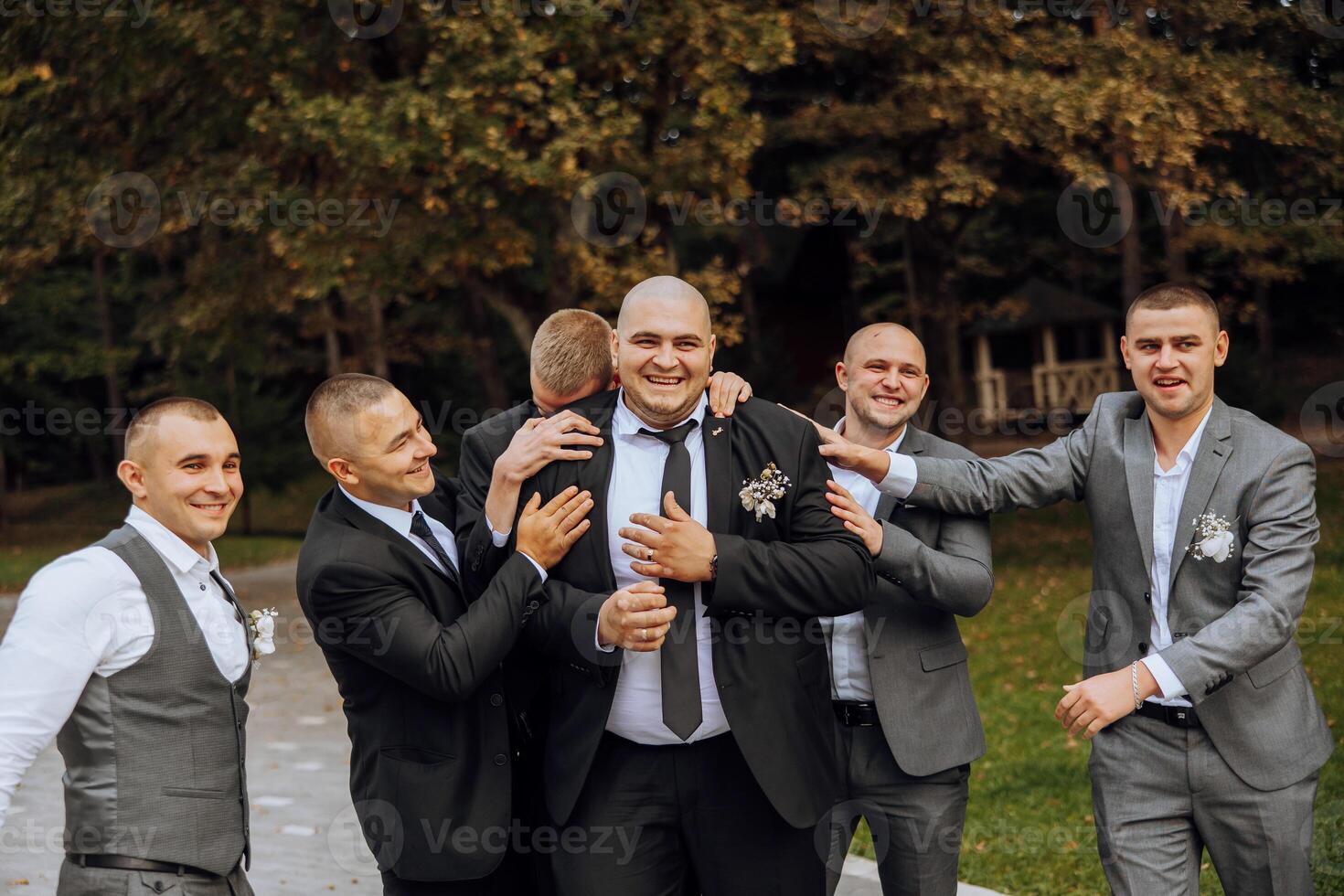 Wedding photography. The groom and his friends photo