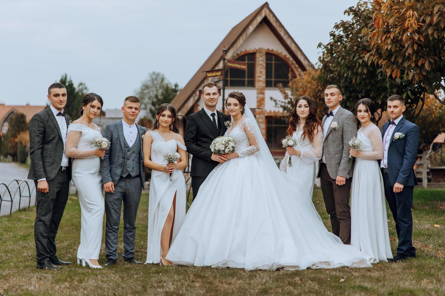 Wedding photo session in nature. The bride and groom and their friends