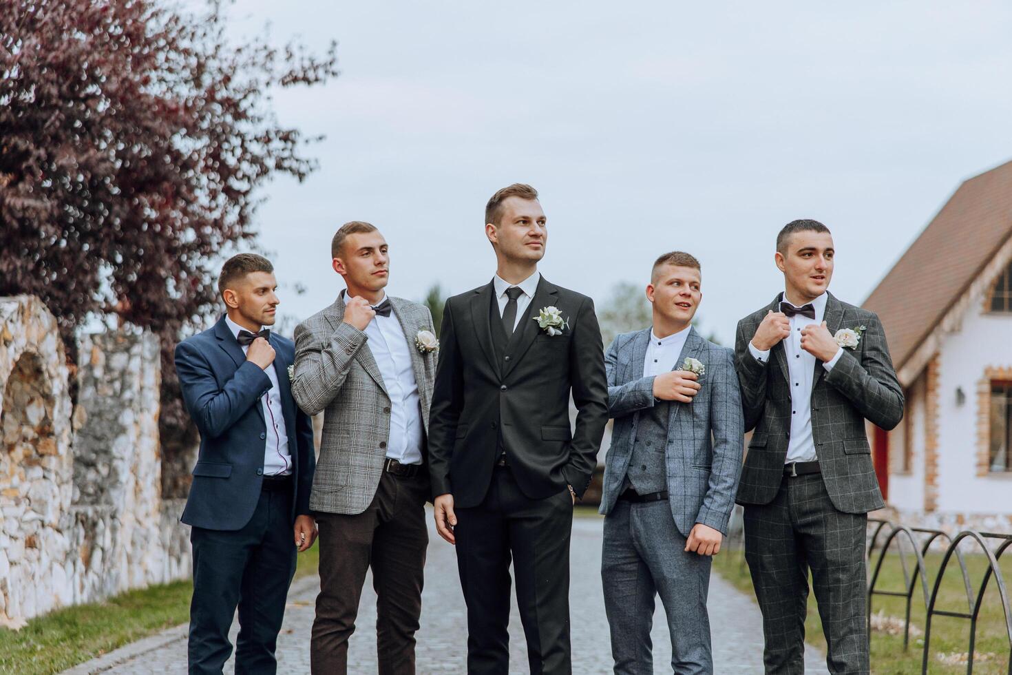 Wedding photography. The groom and his friends photo