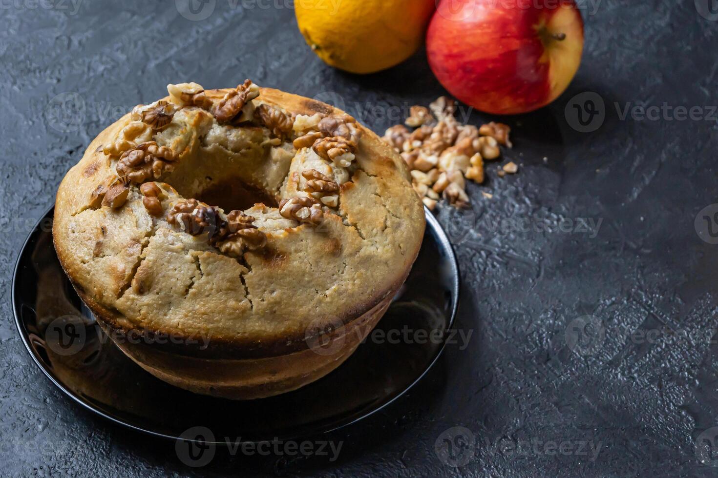 Wet walnut, orange and apple pudding. photo