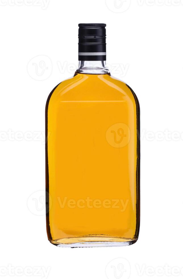 Glass bottle with yellow liquid on a white background photo