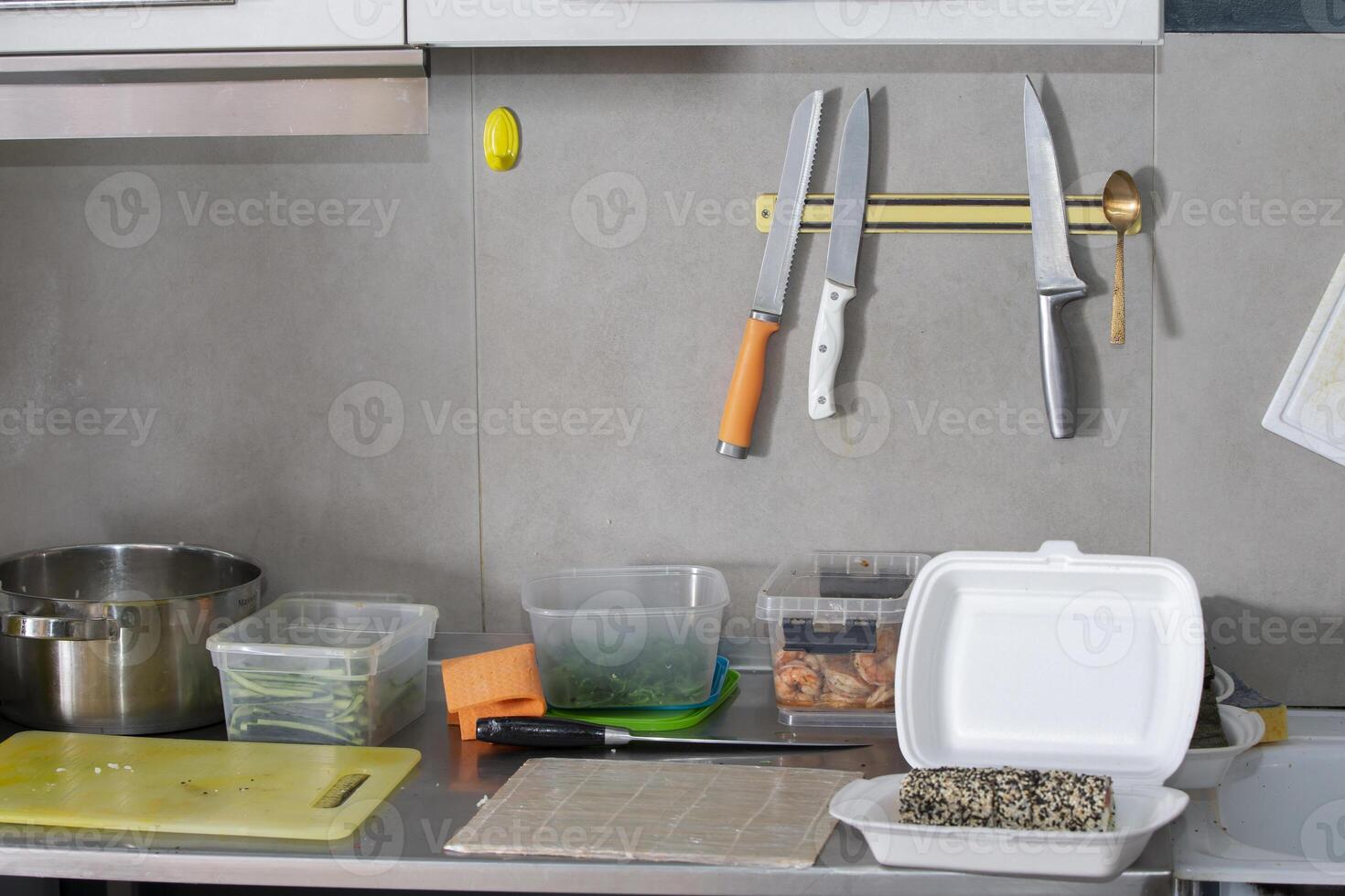 Part of a professional kitchen for preparing Japanese sushi rolls. photo