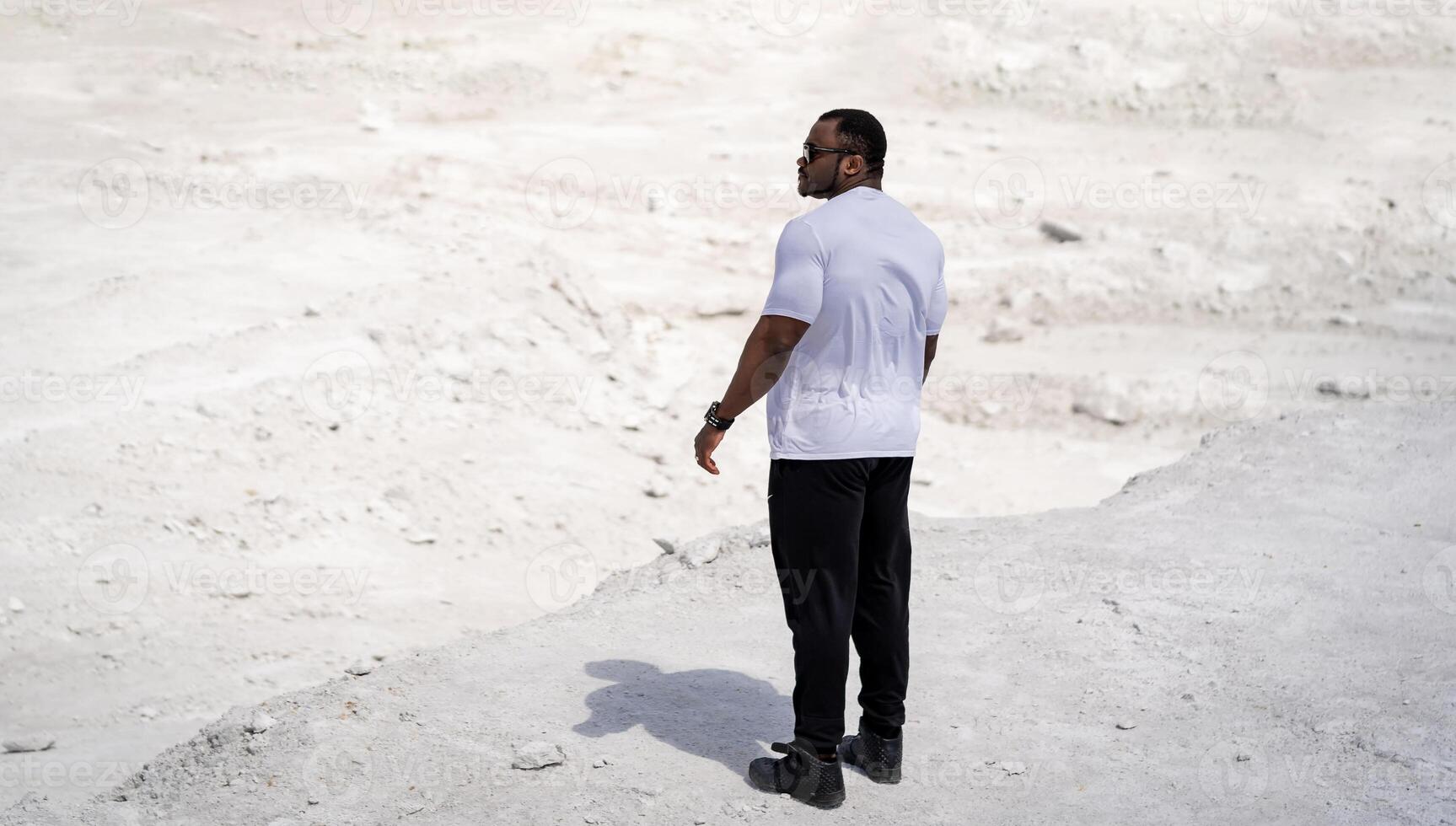 Young handsome black man outdoor. Summer looking person outside. photo