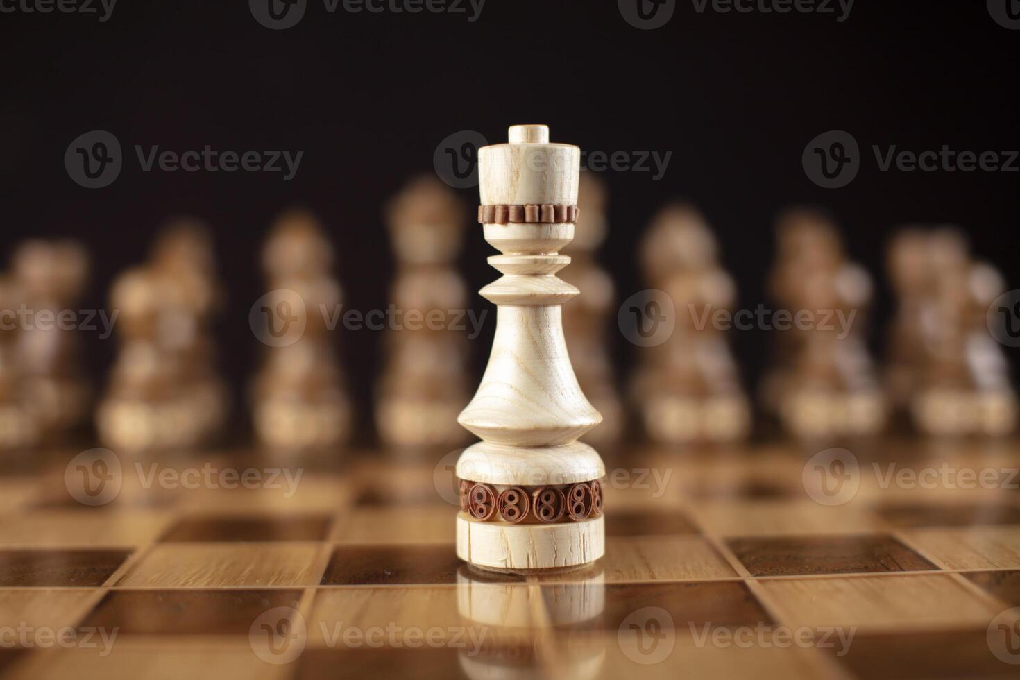 Chess on a dark background. A puzzle game with tricky combinations that requires planning and thinking. photo