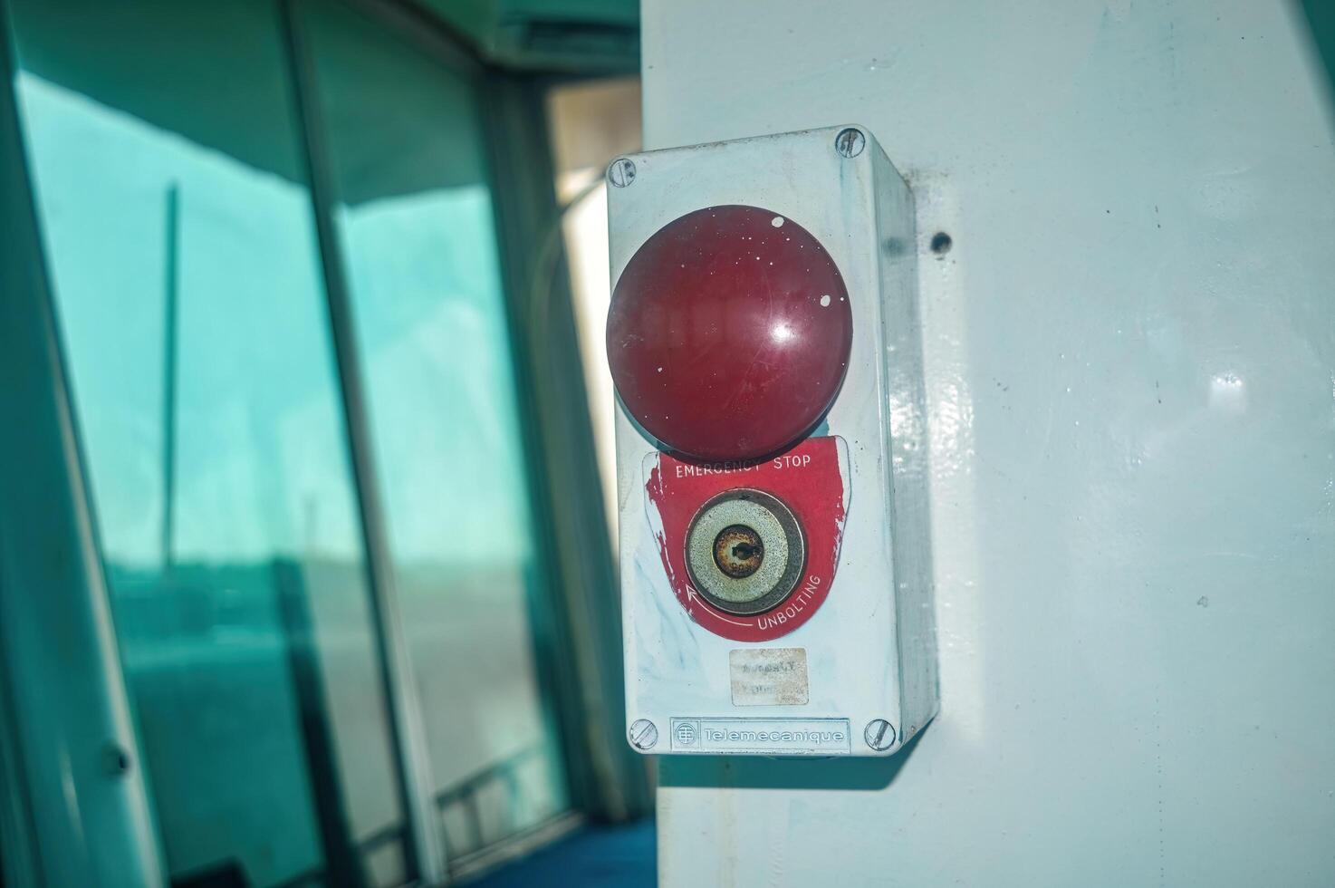 an ancient emergency button attached to the wall, Indonesia, 6 January 2024 photo