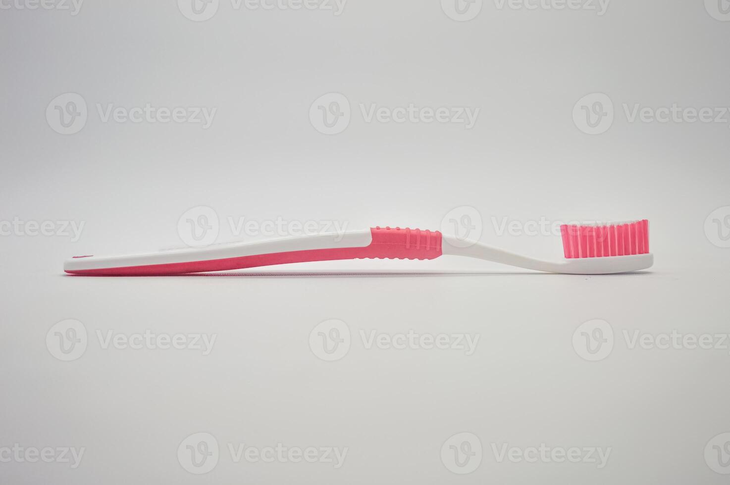 a toothbrush isolated on a white background photo