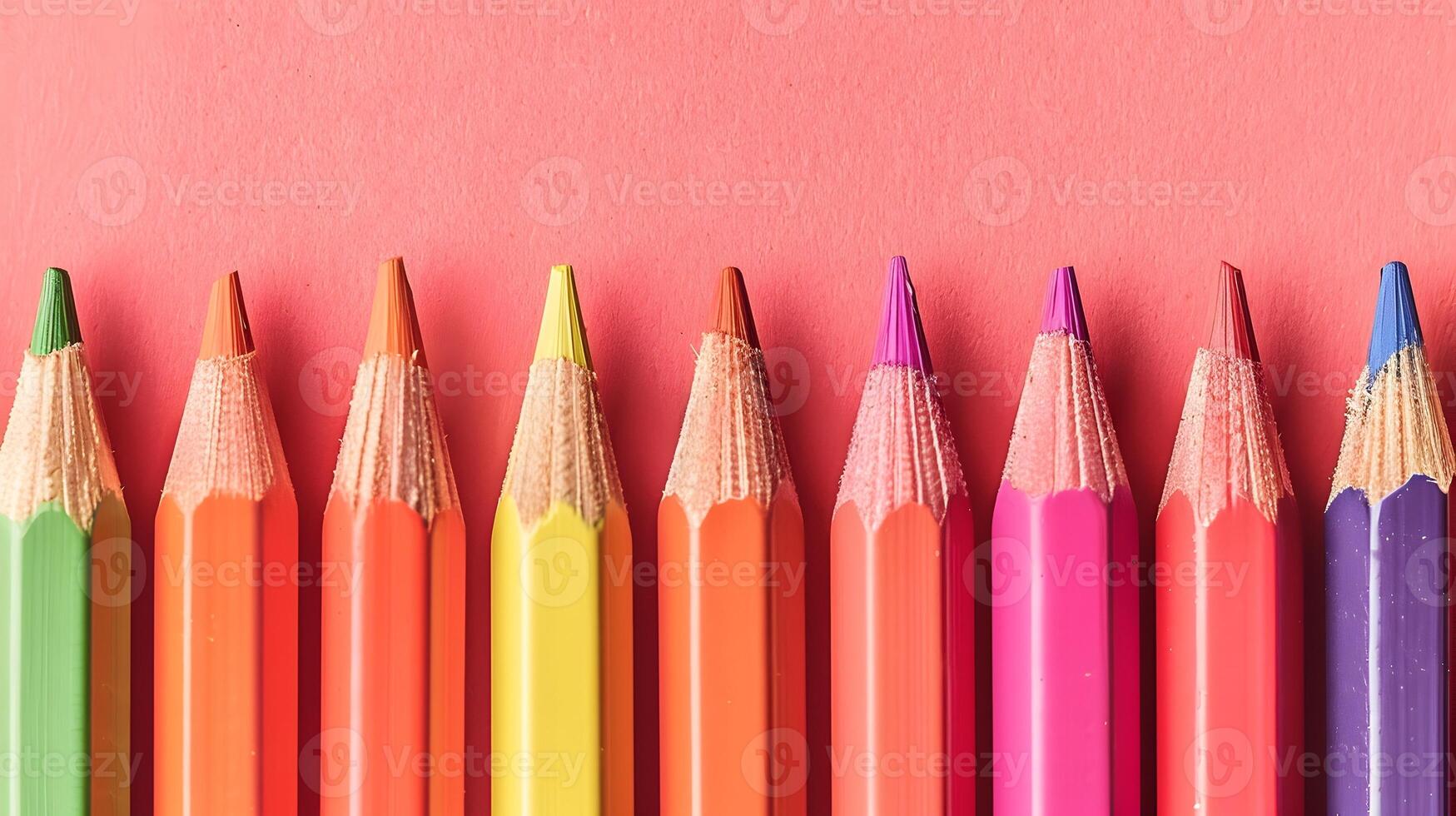 AI generated Vibrant Colored Pencils Arranged on Soft Coral Background Ideal for Copy Space and Creative Design photo