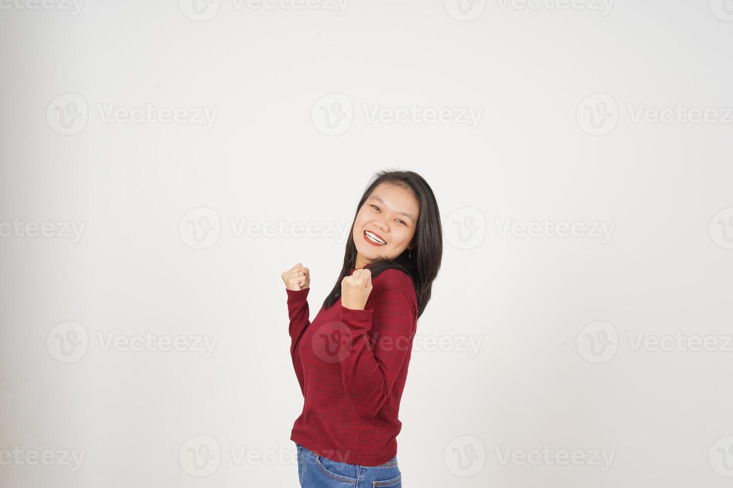 Young Asian woman in Red t-shirt doing yes excited or celebration gesture isolated on white background photo