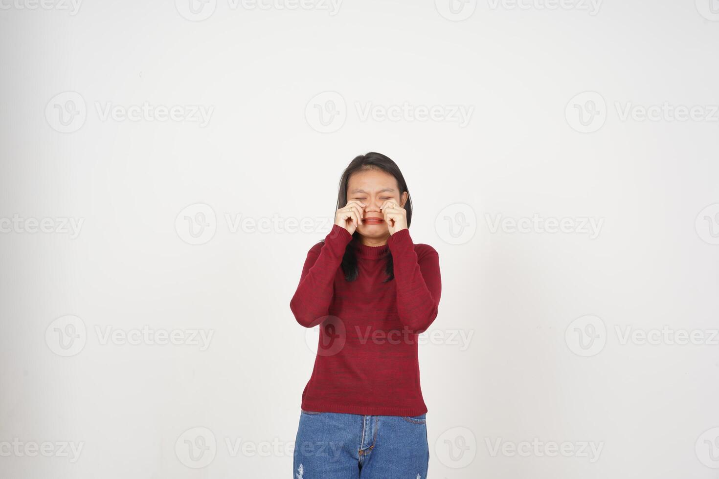 Young Asian woman in Red t-shirt sad crying isolated on white background photo