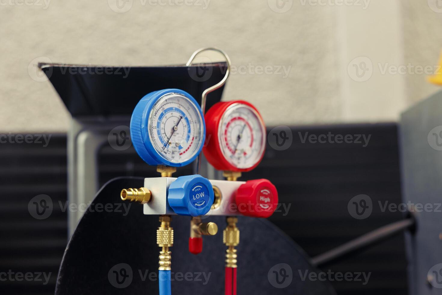 Close up of broken manometers used for checking hvac system freon pressure, in need of servicing. Set of barometer high or low refrigerant levels benchmarking air conditioner component photo