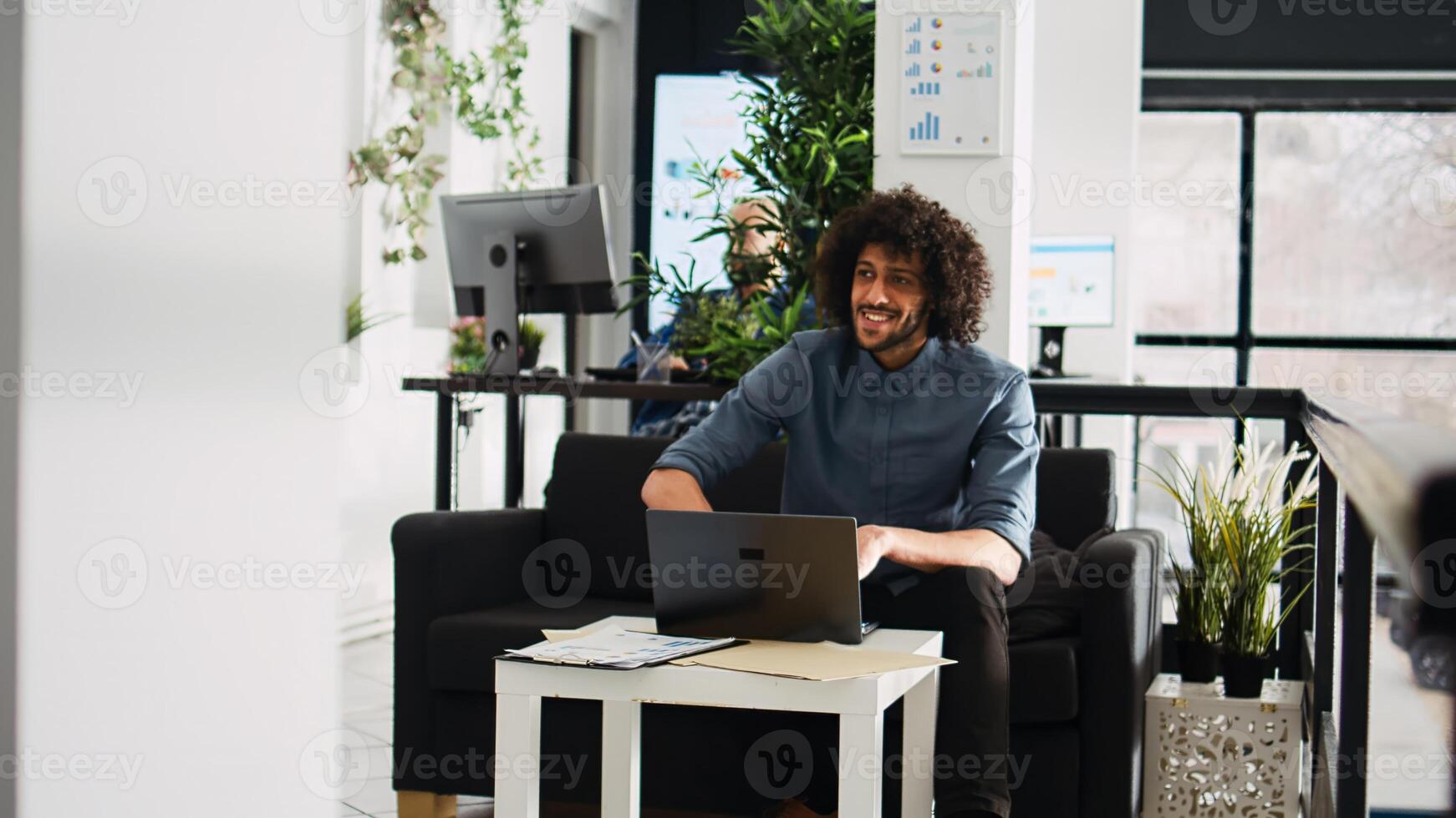 Agency worker examine statistics results on laptop, working in small business open space. Professional office employee brainstorming research project, AI developer waiting for client. photo