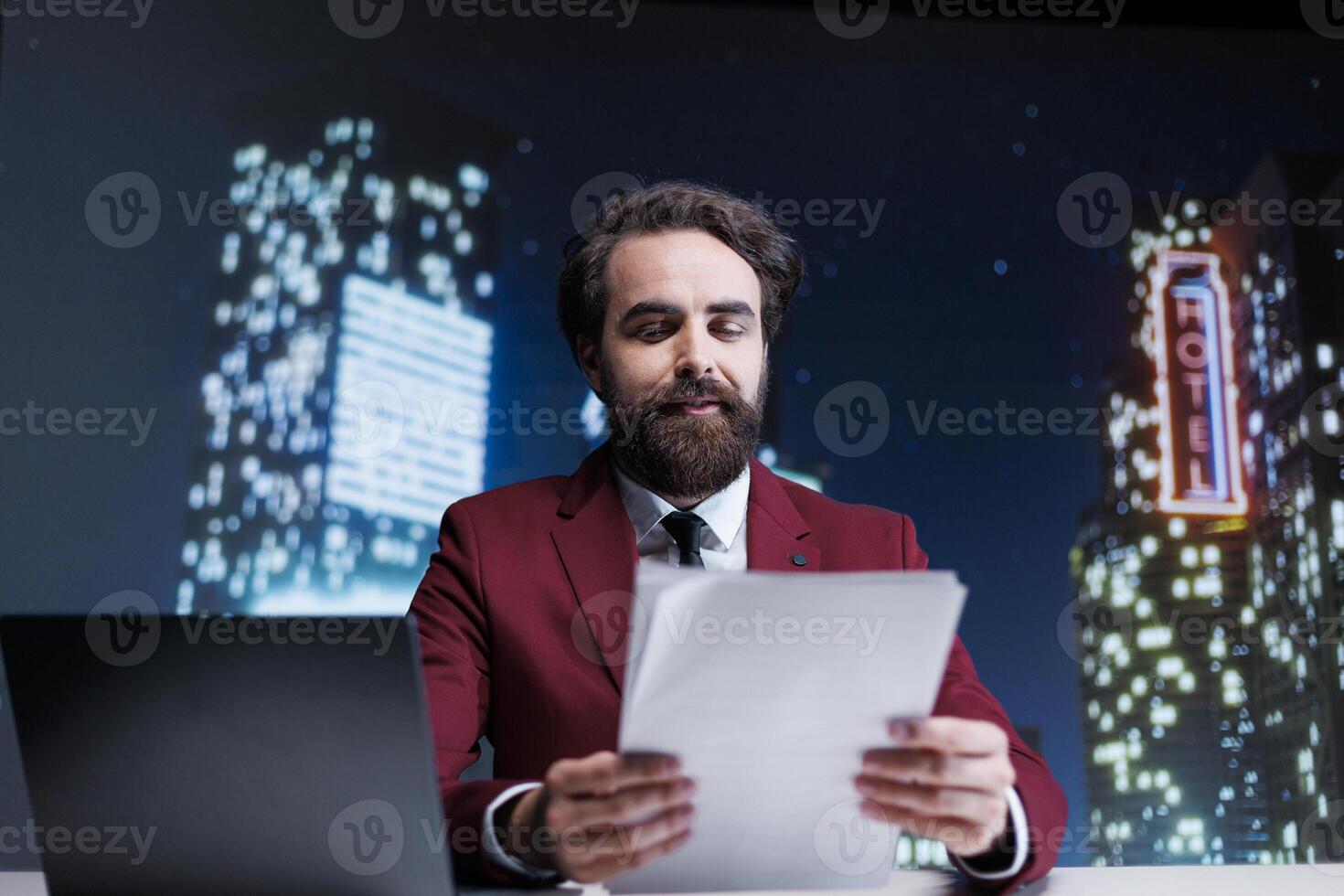 TV presenter reading headlines using media papers on live television night show, creating news reportage for tv content. Journalist reporting daily information about public events. photo