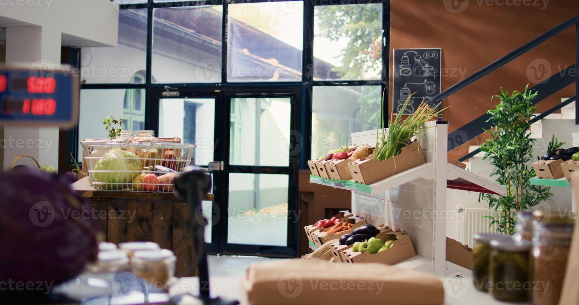 Bulk products stored in reusable jars used by environmentally friendly supermarket to lower carbon footprint. Local shop selling homegrown fruits and vegetables, biodegradable packaging. photo