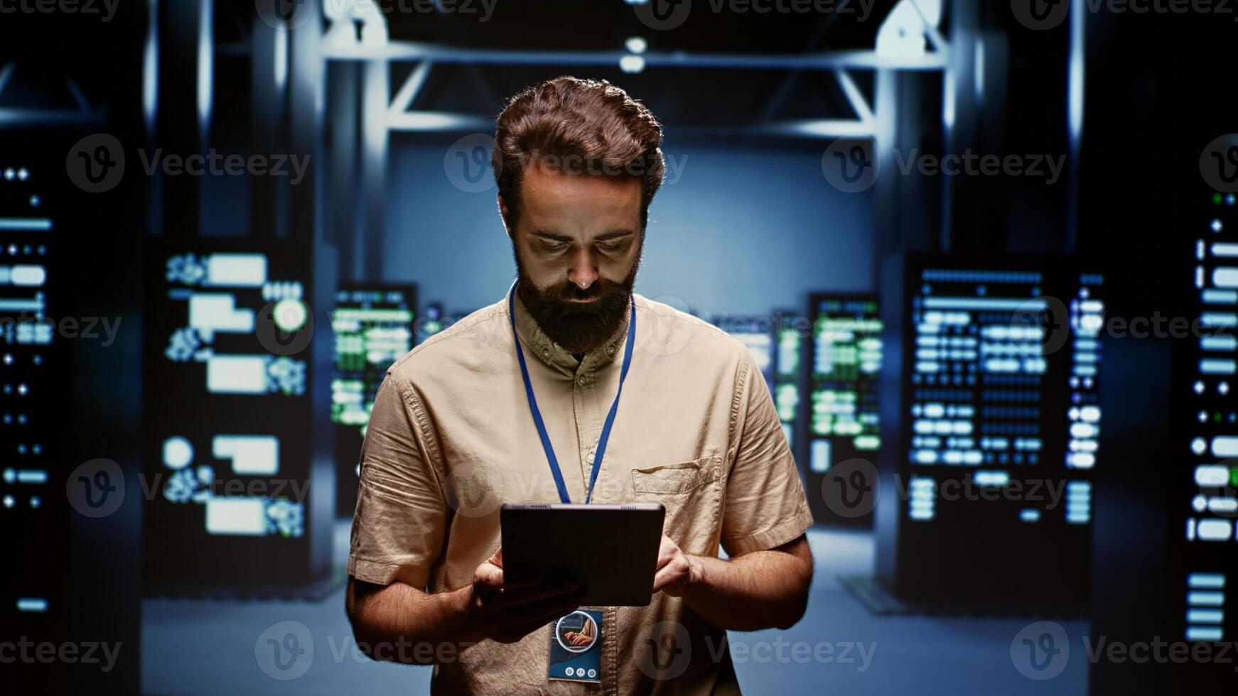 Technician doing routine maintenance, helping extend equipment life span and avoiding downtime. Worker monitoring server infrastructure components for issues such as overheating or power fluctuations photo