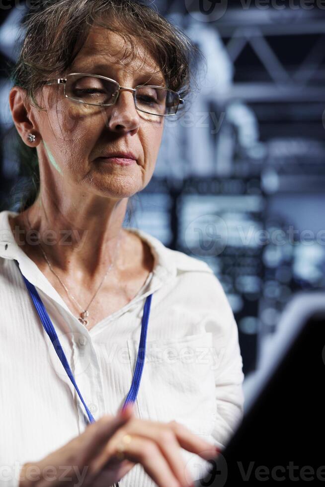 Computer operator using laptop, ensuring valuable data remains shielded ...