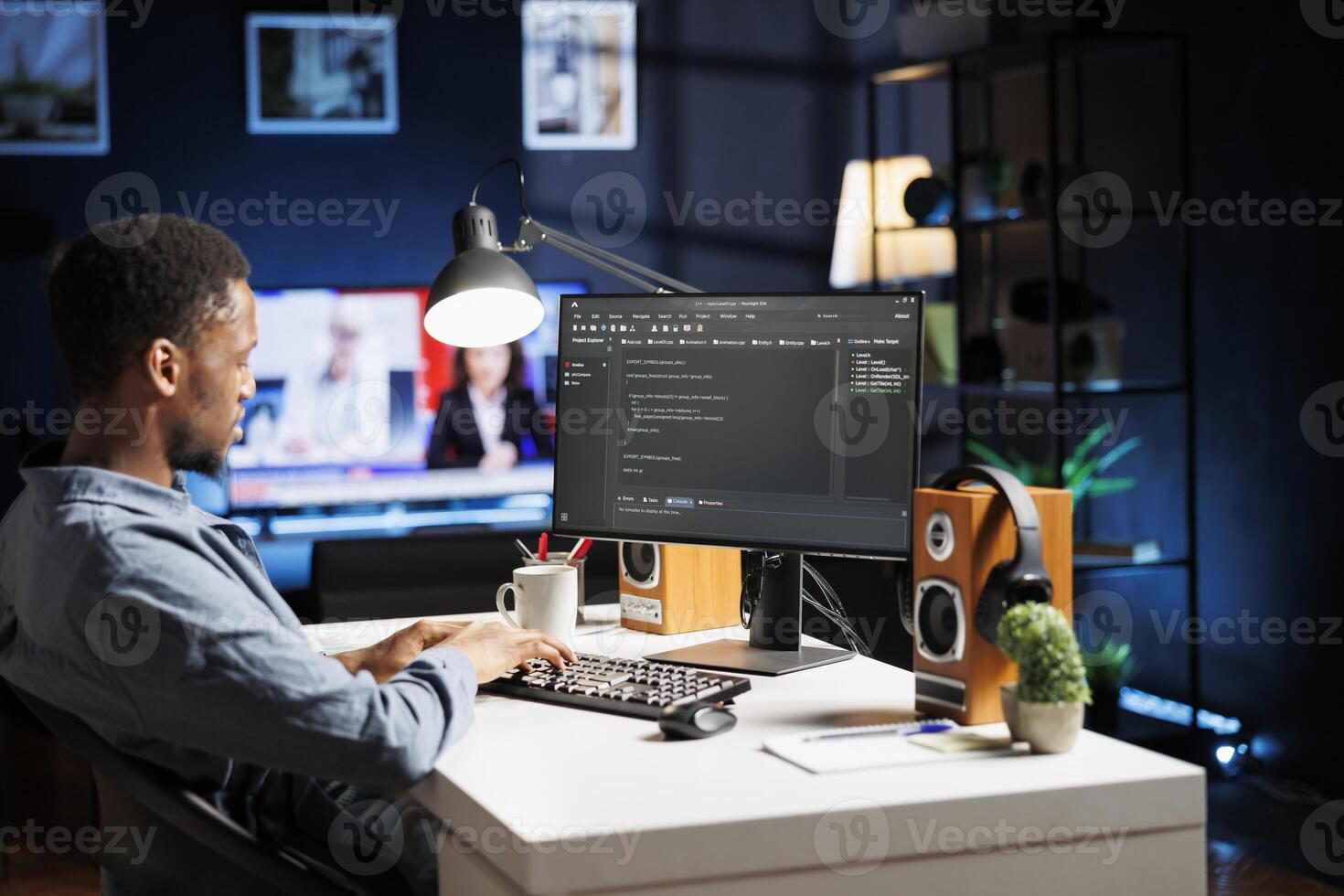 System engineer typing in script code for security and protection, working with programming language at home. African american developer coding and debugging server on terminal window. photo