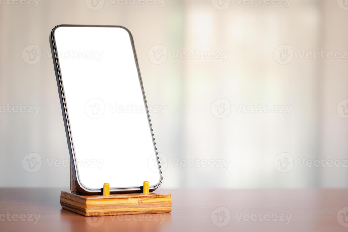 Smartphone on stand, white screen, soft light, technology and communication blend photo