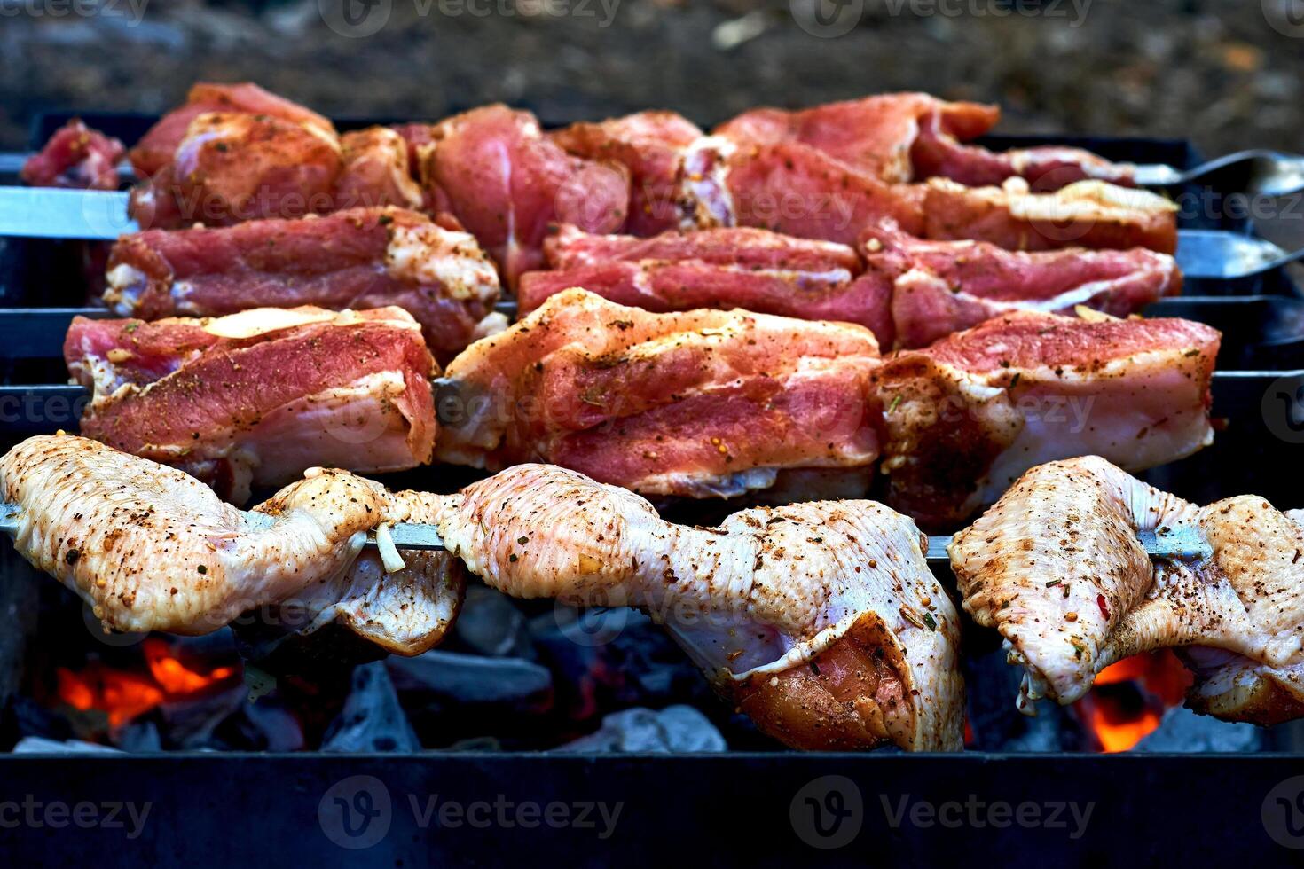 Pieces of fresh raw meat for barbecue, grilling on skewers photo