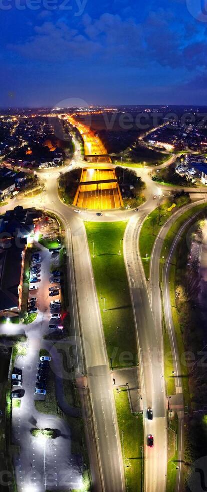 Aerial Panoramic view of Illuminated Central Hatfield City of England UK During Night. March 9th, 2024 photo