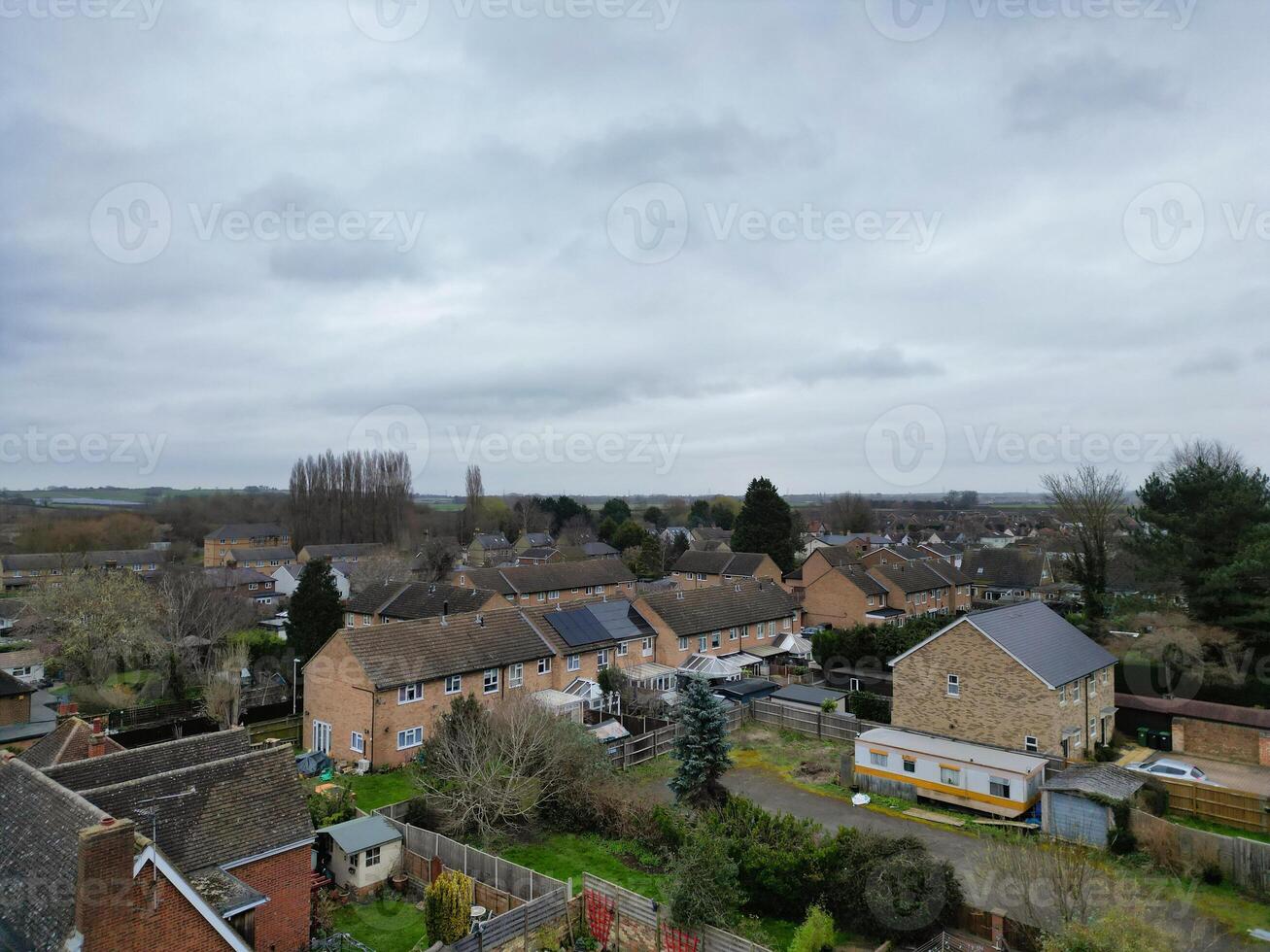 High Angle View of Arlesey Town of England UK. The Footage Was Captured During Cloudy and Rainy Day of Feb 28th, 2024 photo