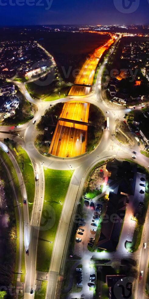 Aerial Panoramic view of Illuminated Central Hatfield City of England UK During Night. March 9th, 2024 photo