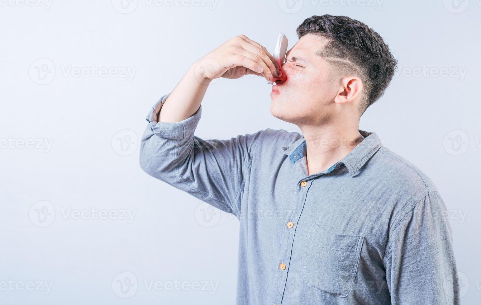 Portrait of person with nasal congestion isolated. People suffering with irritated nose isolated photo