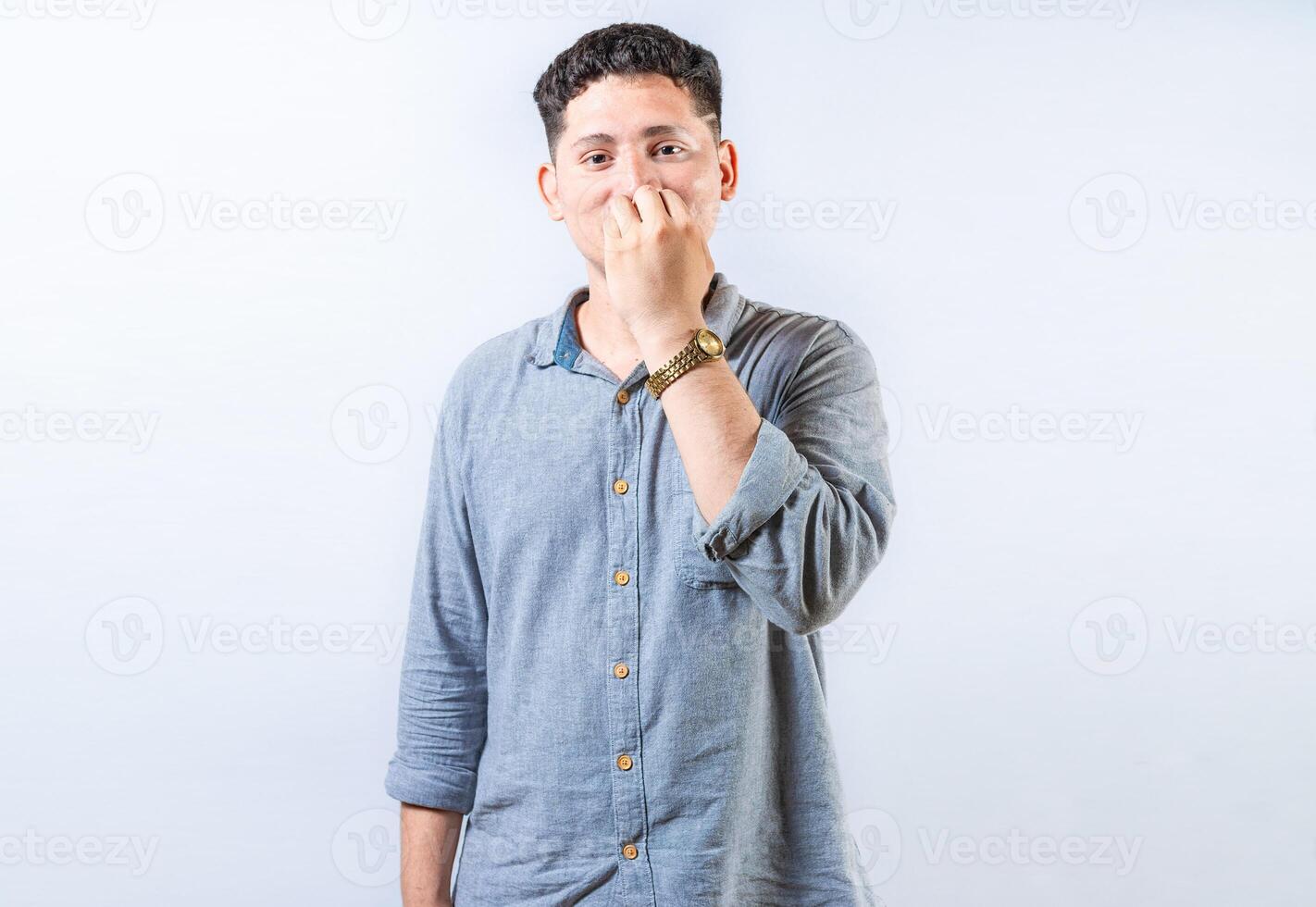 Person gesturing EAT in sign language. Deaf and dumb person gesturing DRINK in sign language. Young man gesturing EAT in sign language photo