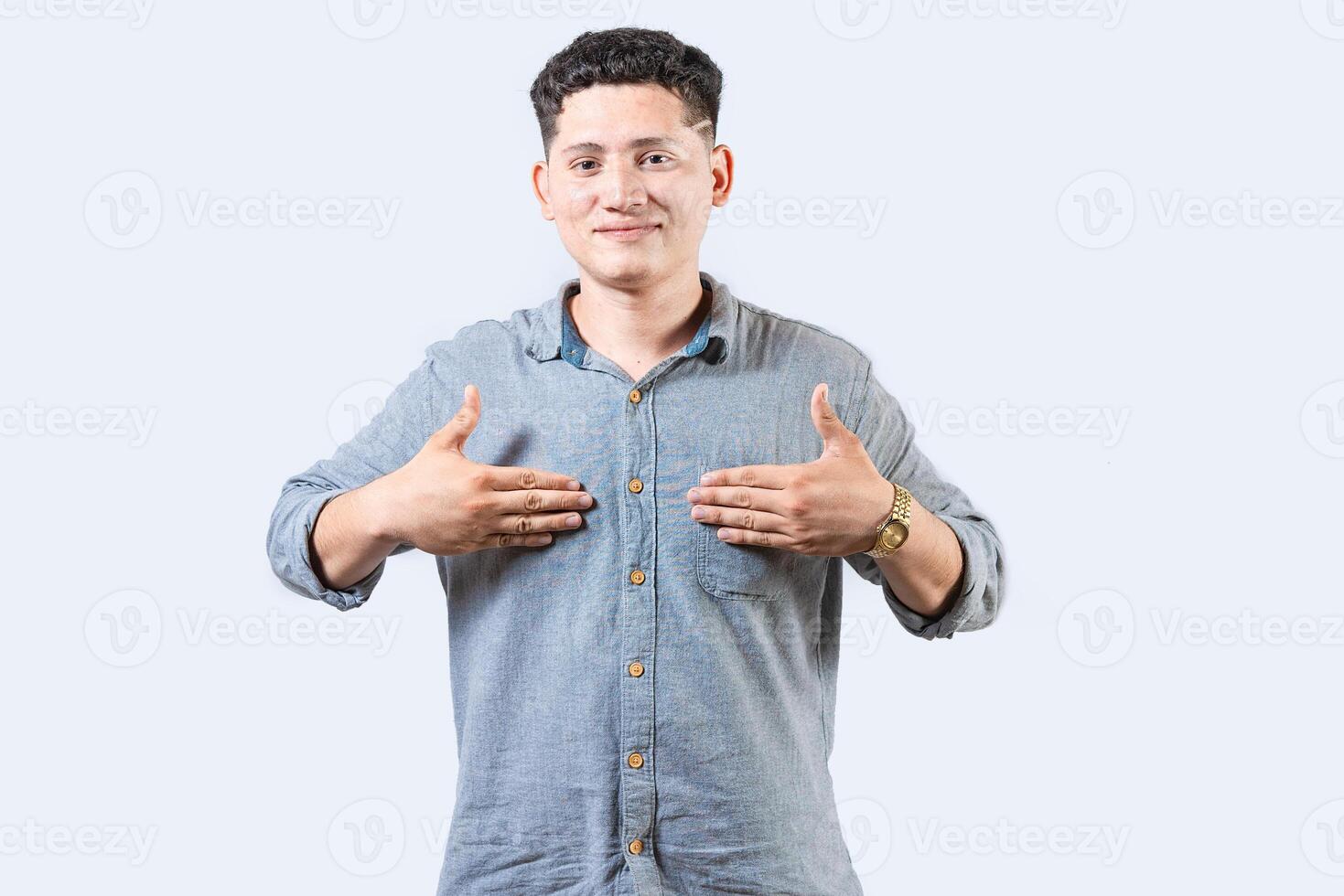 Interpreter person gesturing HAPPINESS in sign language. Smiling young man gesturing HAPPINESS in sign language photo