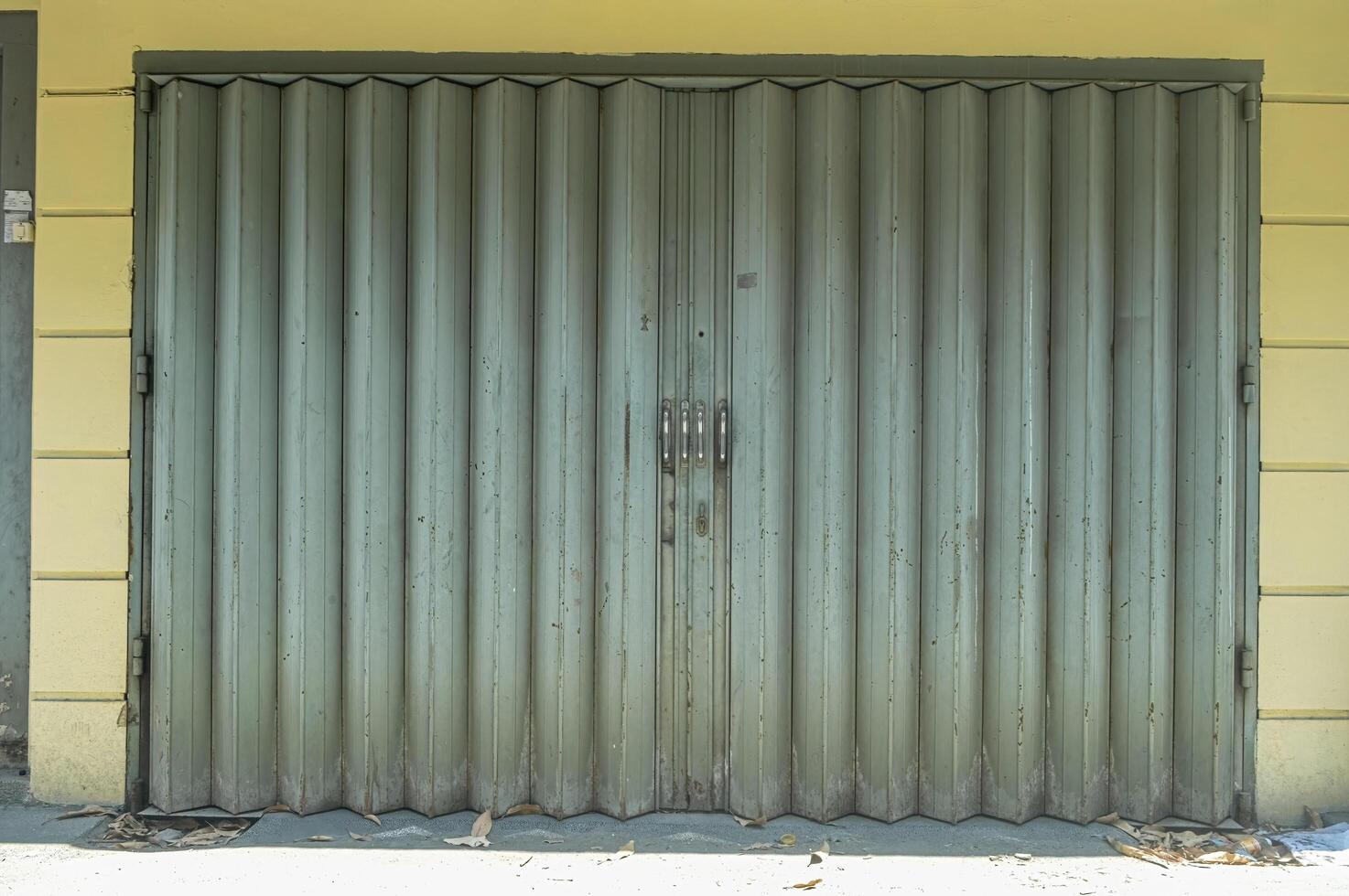 a locked iron harmonica door photo