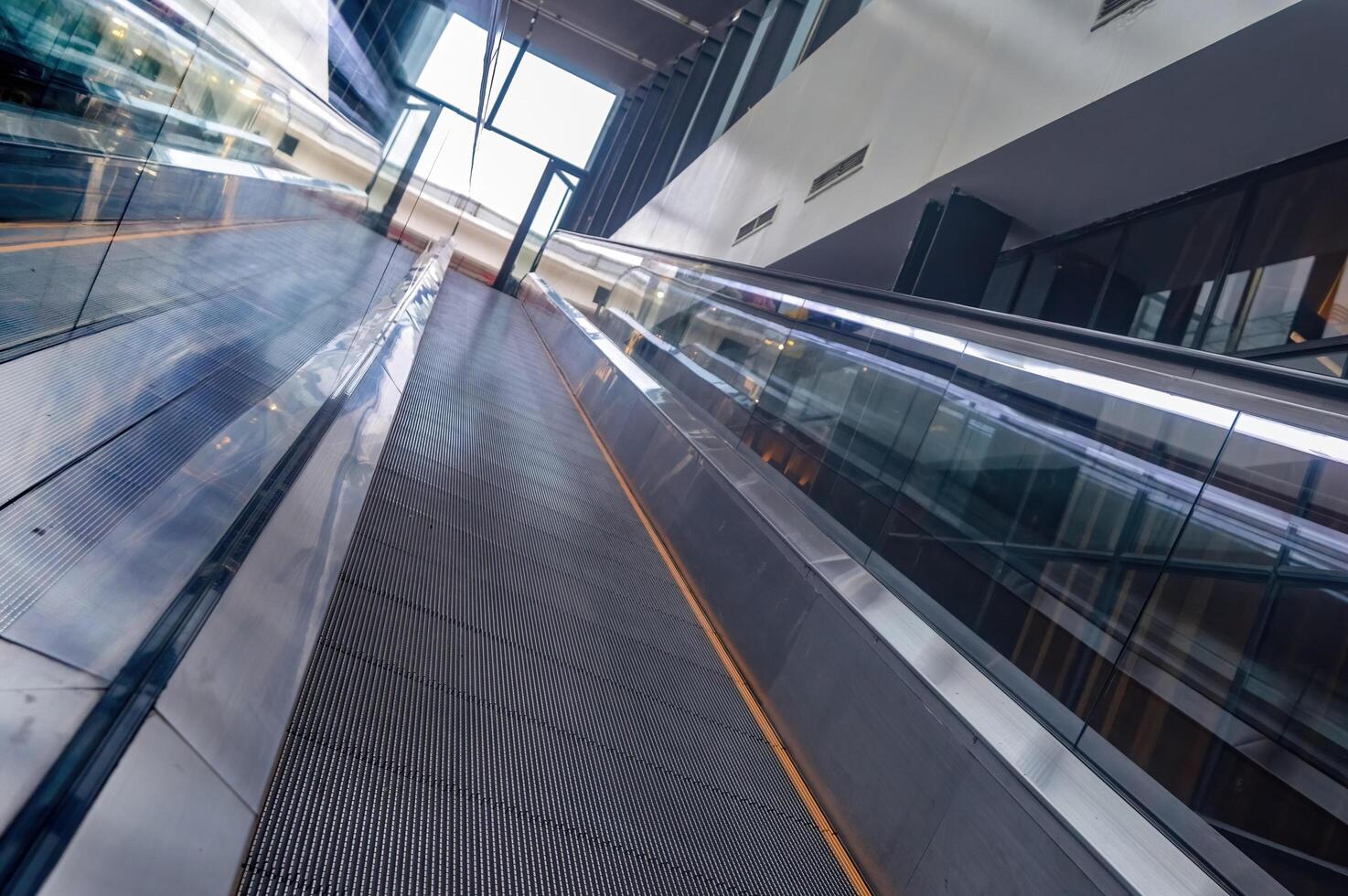 an upward escalator that looks futuristic photo