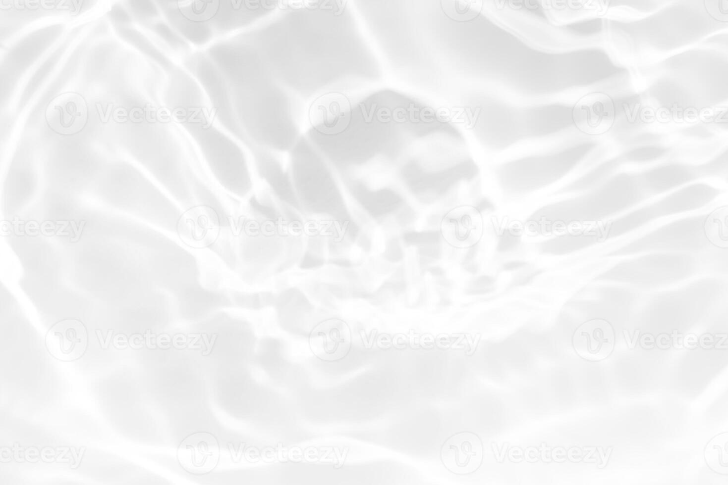 Bluewater waves on the surface ripples blurred. Defocus blurred transparent blue colored clear calm water surface texture with splash and bubbles. Water waves with shining pattern texture background. photo