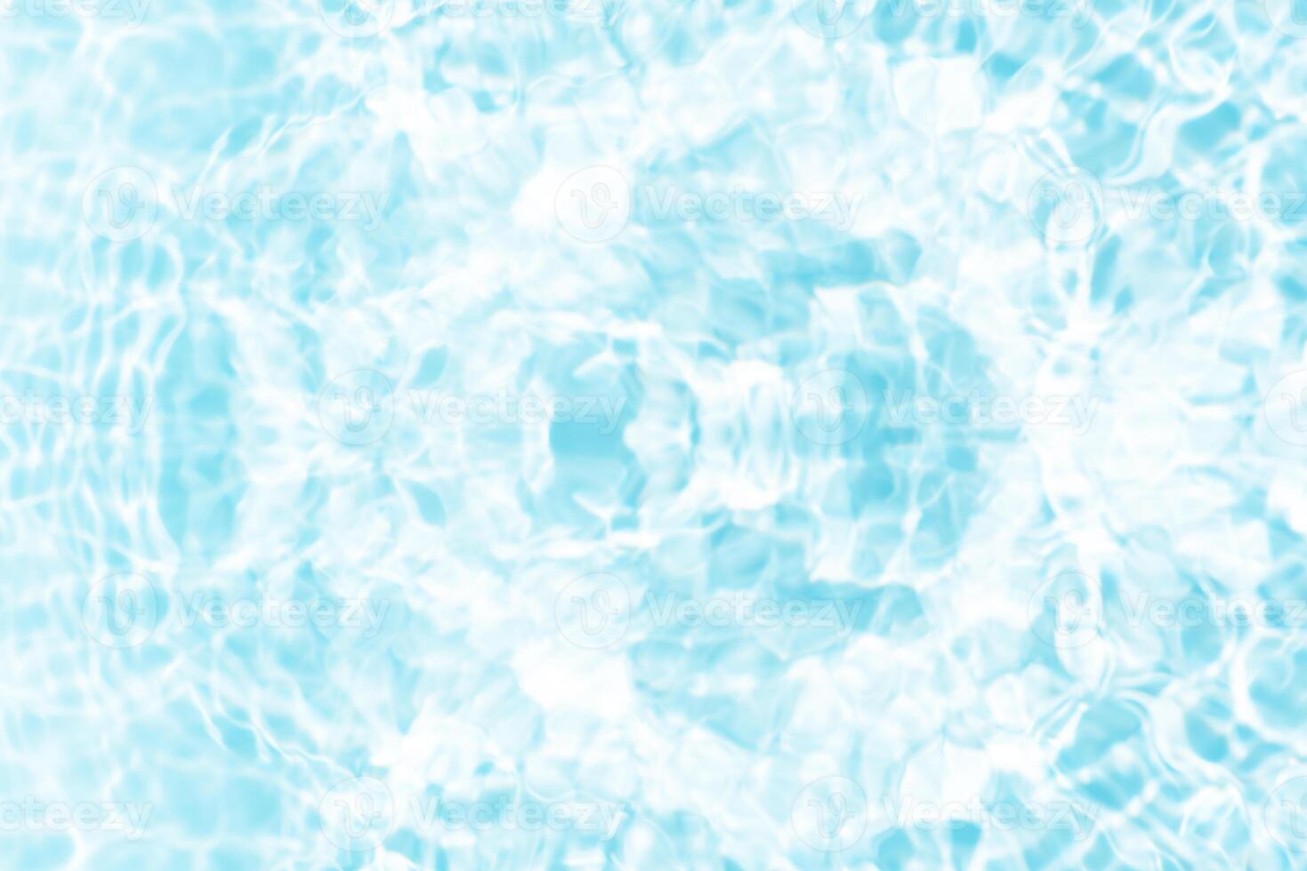 Bluewater waves on the surface ripples blurred. Defocus blurred transparent blue colored clear calm water surface texture with splash and bubbles. Water waves with shining pattern texture background. photo