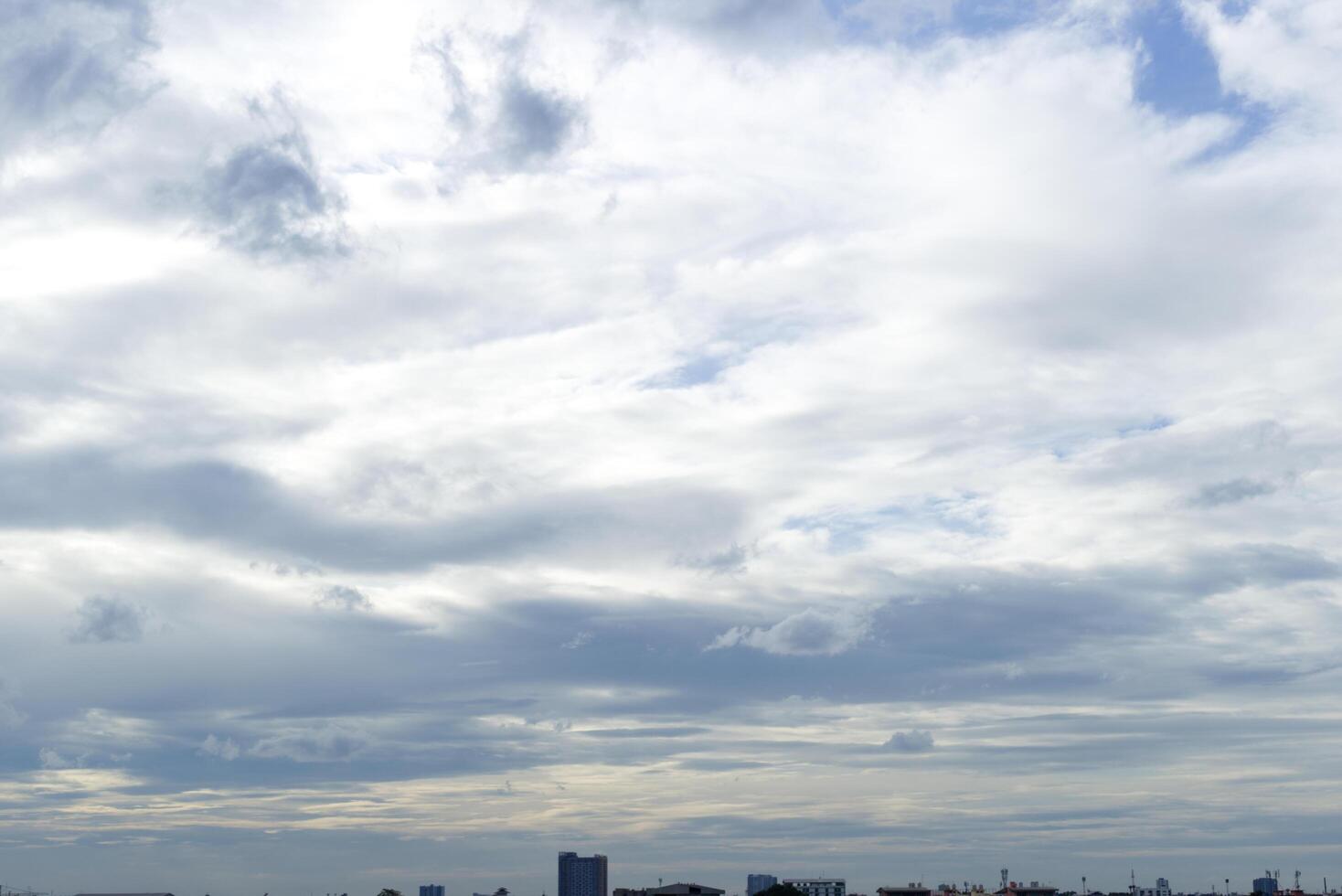 dark blue cloud with white light sky background and city light midnight evening time with dusk cloudy sky photo