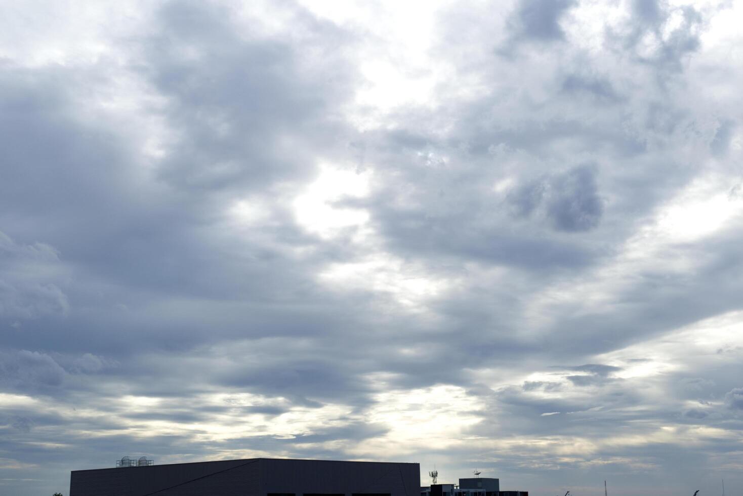 dark blue cloud with white light sky background and city light midnight evening time with dusk cloudy sky photo