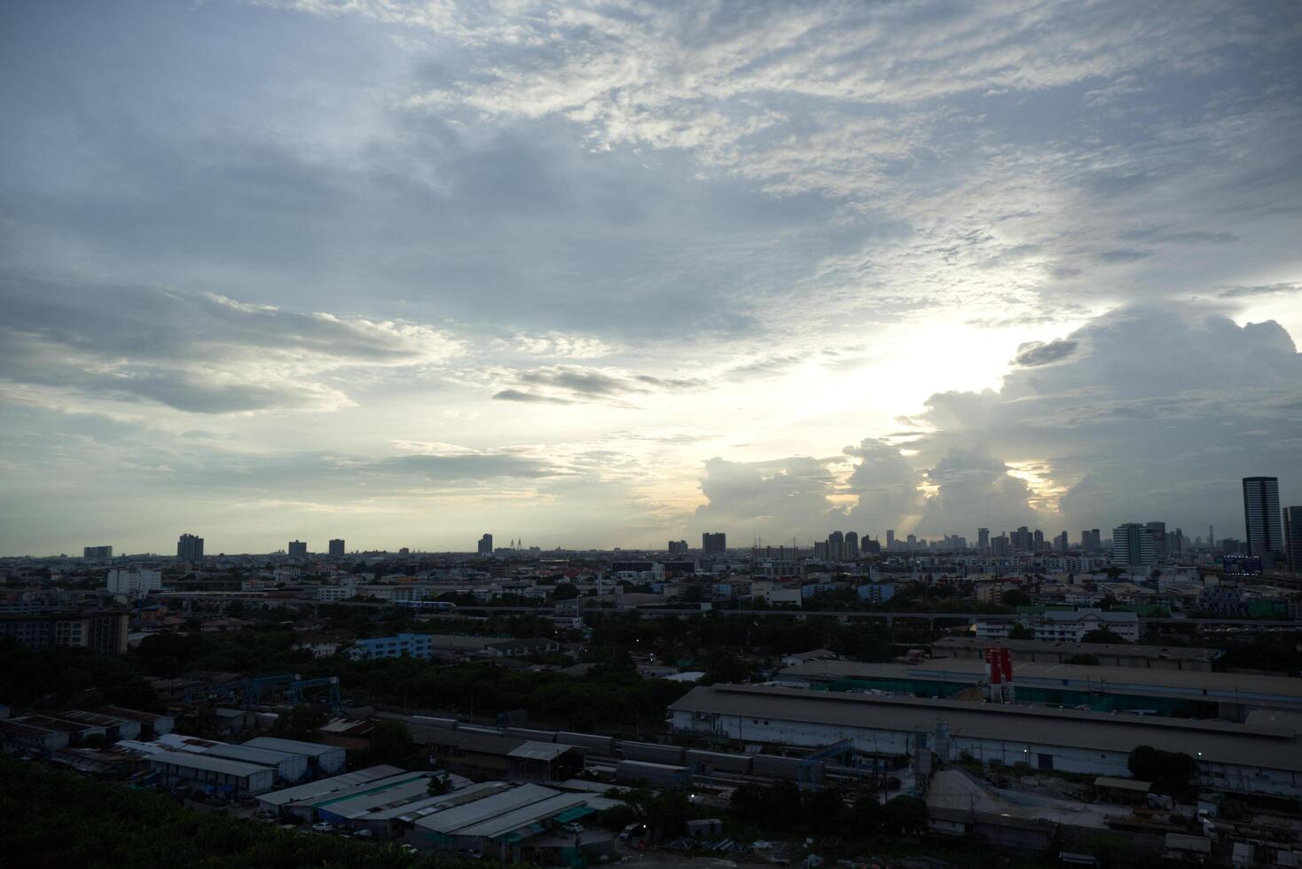 dark blue cloud with white light sky background and city light midnight evening time with dusk cloudy sky photo