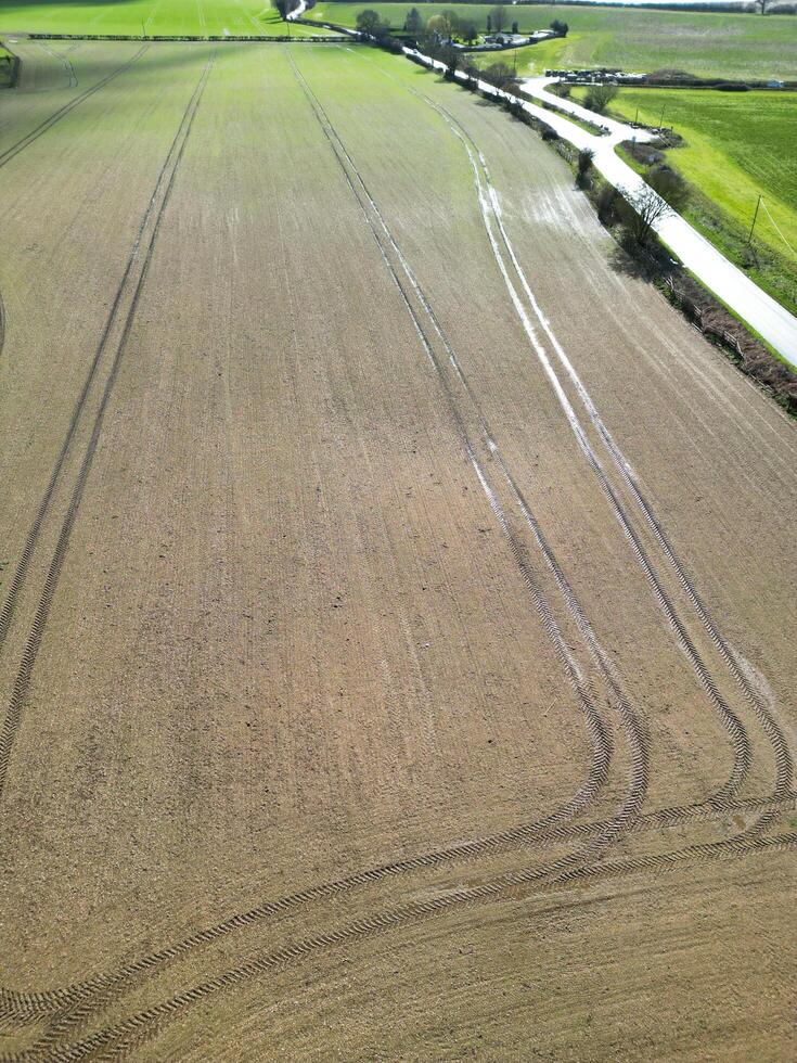 Aerial View of British Countryside and Agricultural Farm Land at Village of England UK. March 1st, 2024 photo