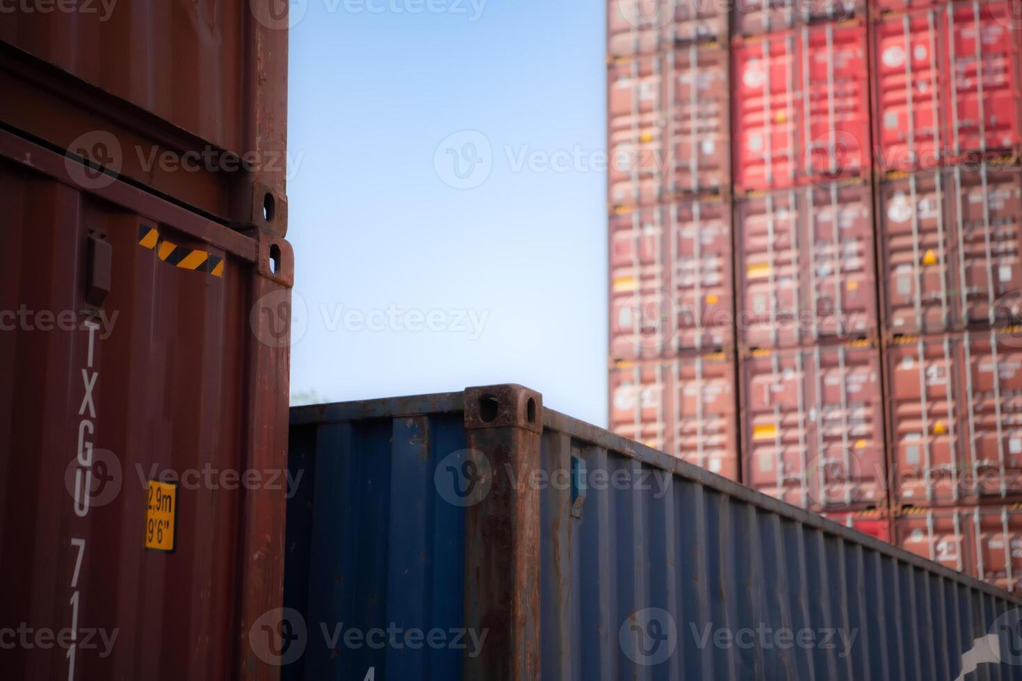 Containers stacked in a freight terminal at the port of Bangkok, Thailand photo