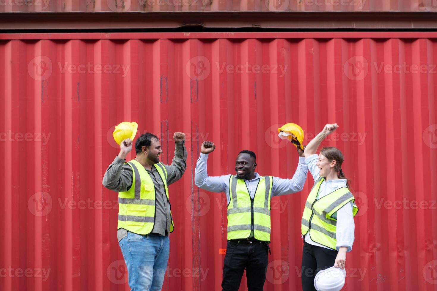 Group of workers in a container storage yard greeting each other during breaks in front of container warehouse, photo