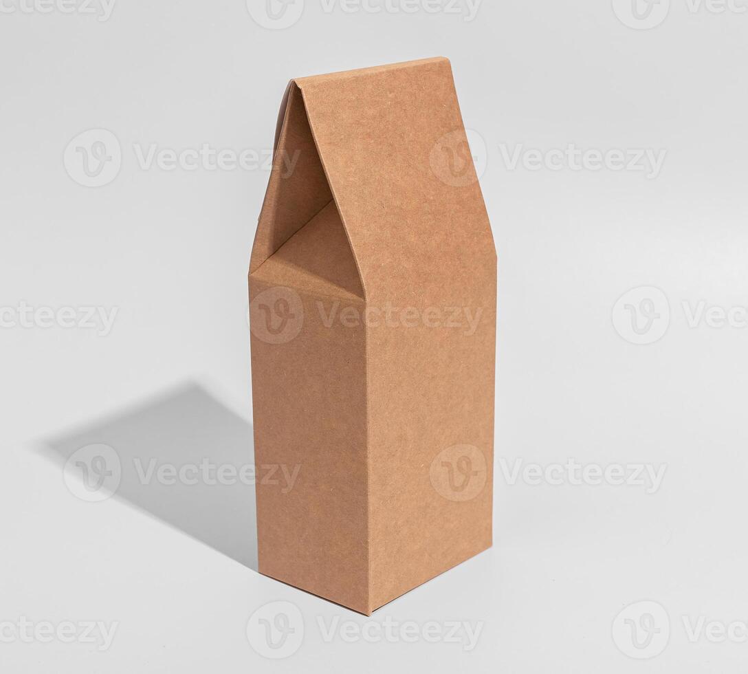 Blank craft product package, brown box mockup. Vertical upright carton pack mock up photo