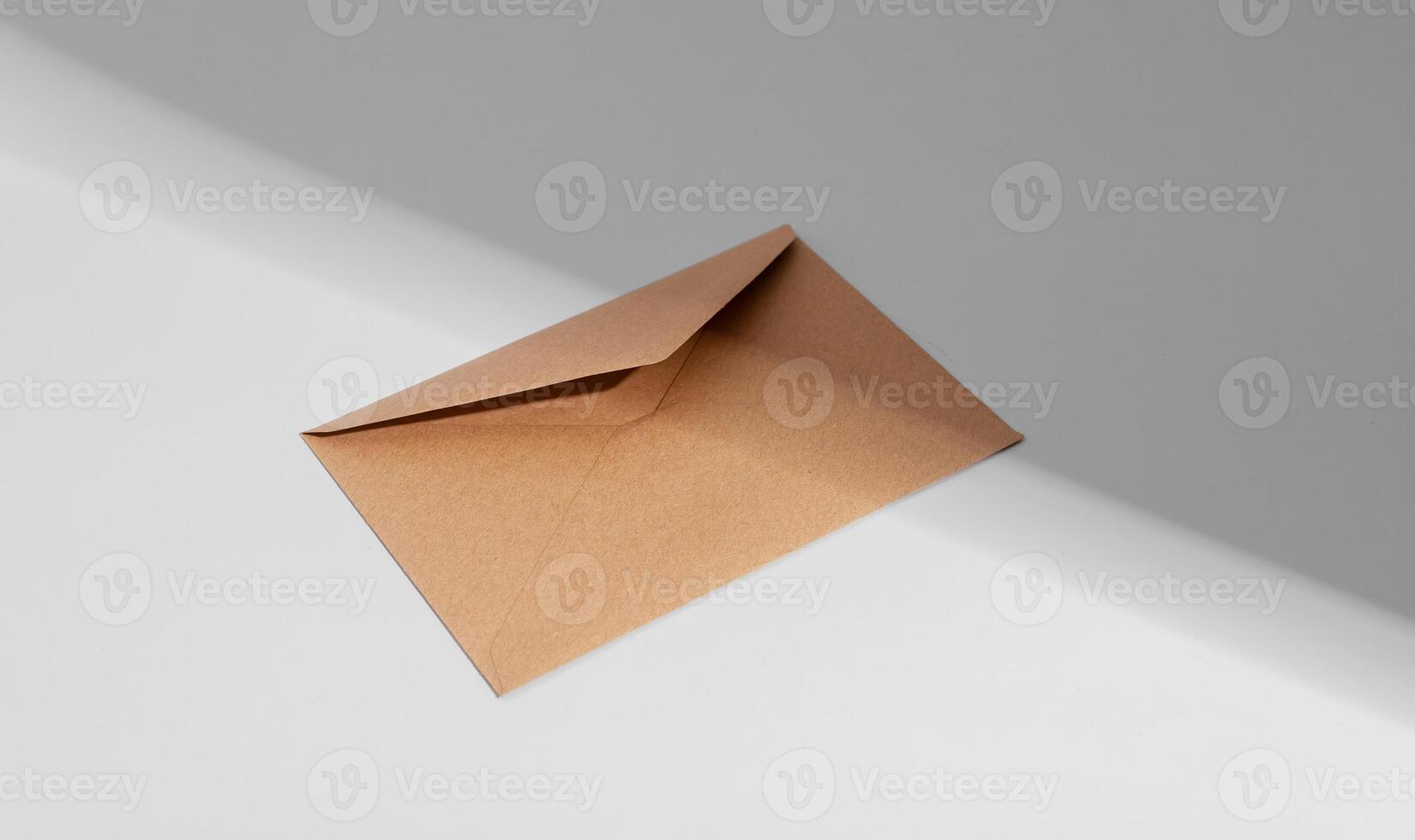 Kraft brown envelope, paper letter, light and shadow photo
