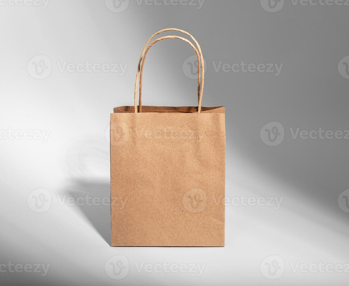 Kraft paper bag with handles, gift package, pack, sack photo